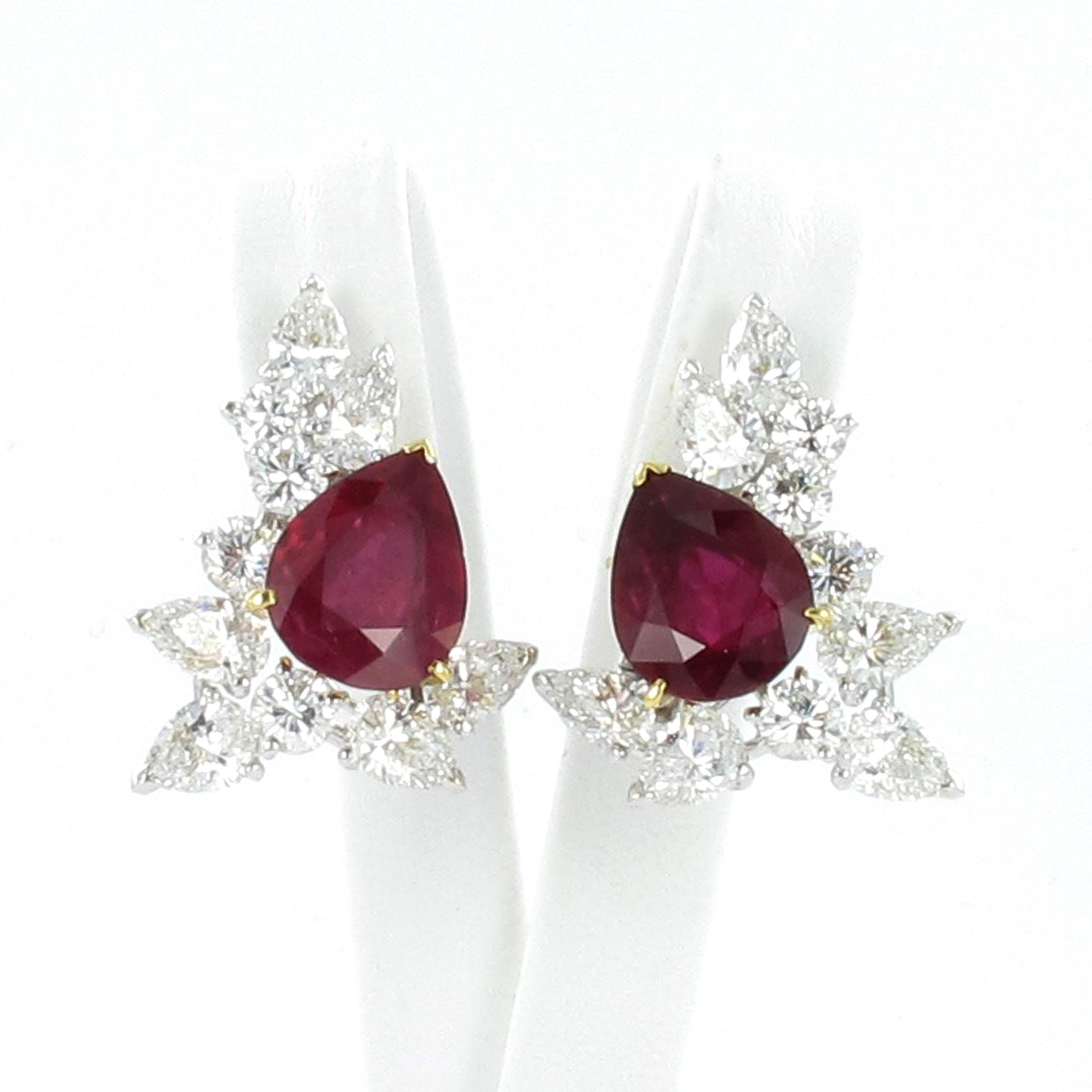 Magnificent pair of ruby and diamond ear clips by Paris based French Jeweller FRED.

Each set with a very fine pear-shaped ruby weighing 3.79 and 4.25 carats respectively. The rubies are accompanied by Gubelin Gem Lab Report quoting Thai origin with