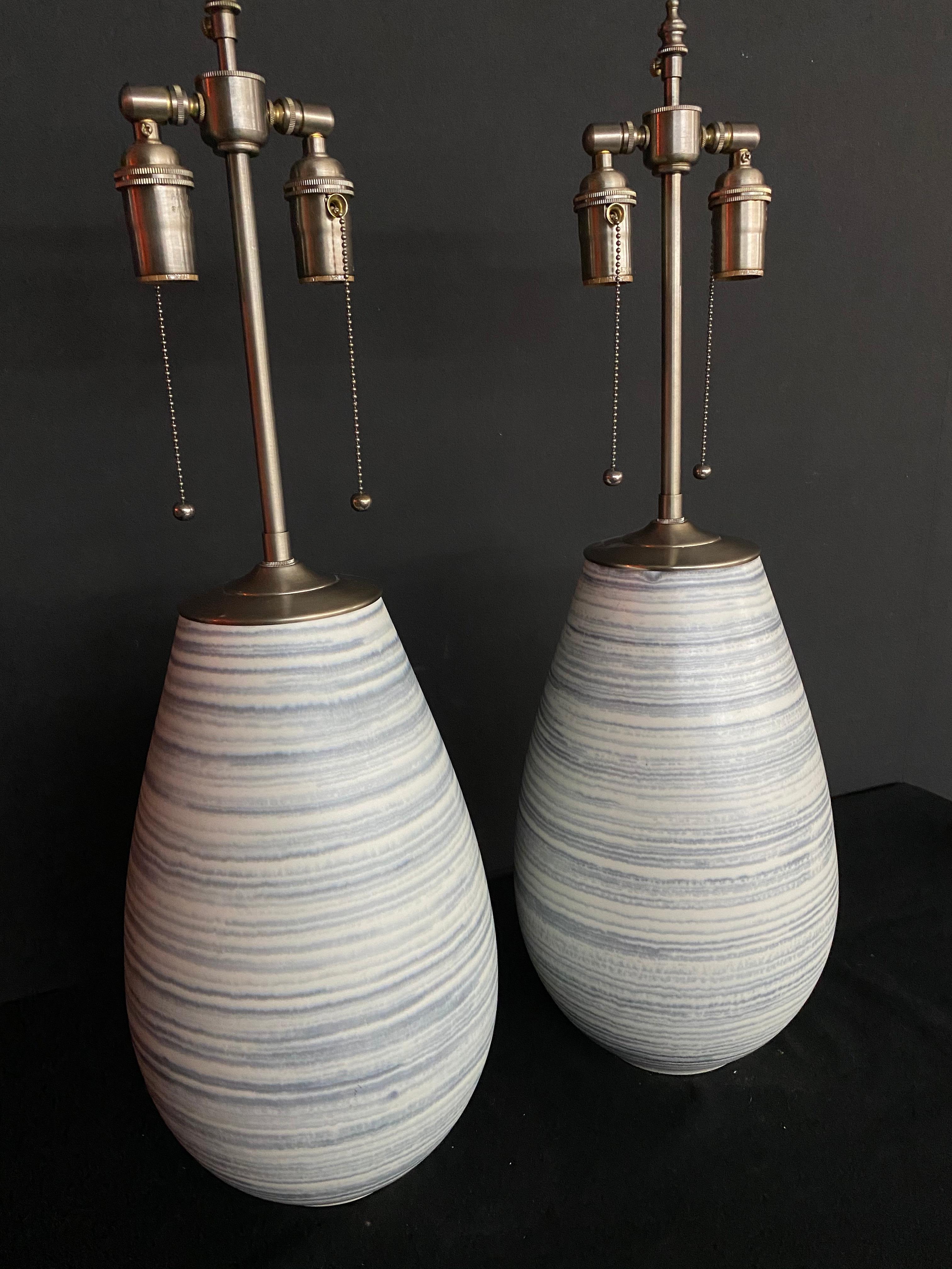 Contemporary Spectacular Pair of Unique Blue & White Striae Orbs with Lamp Application For Sale