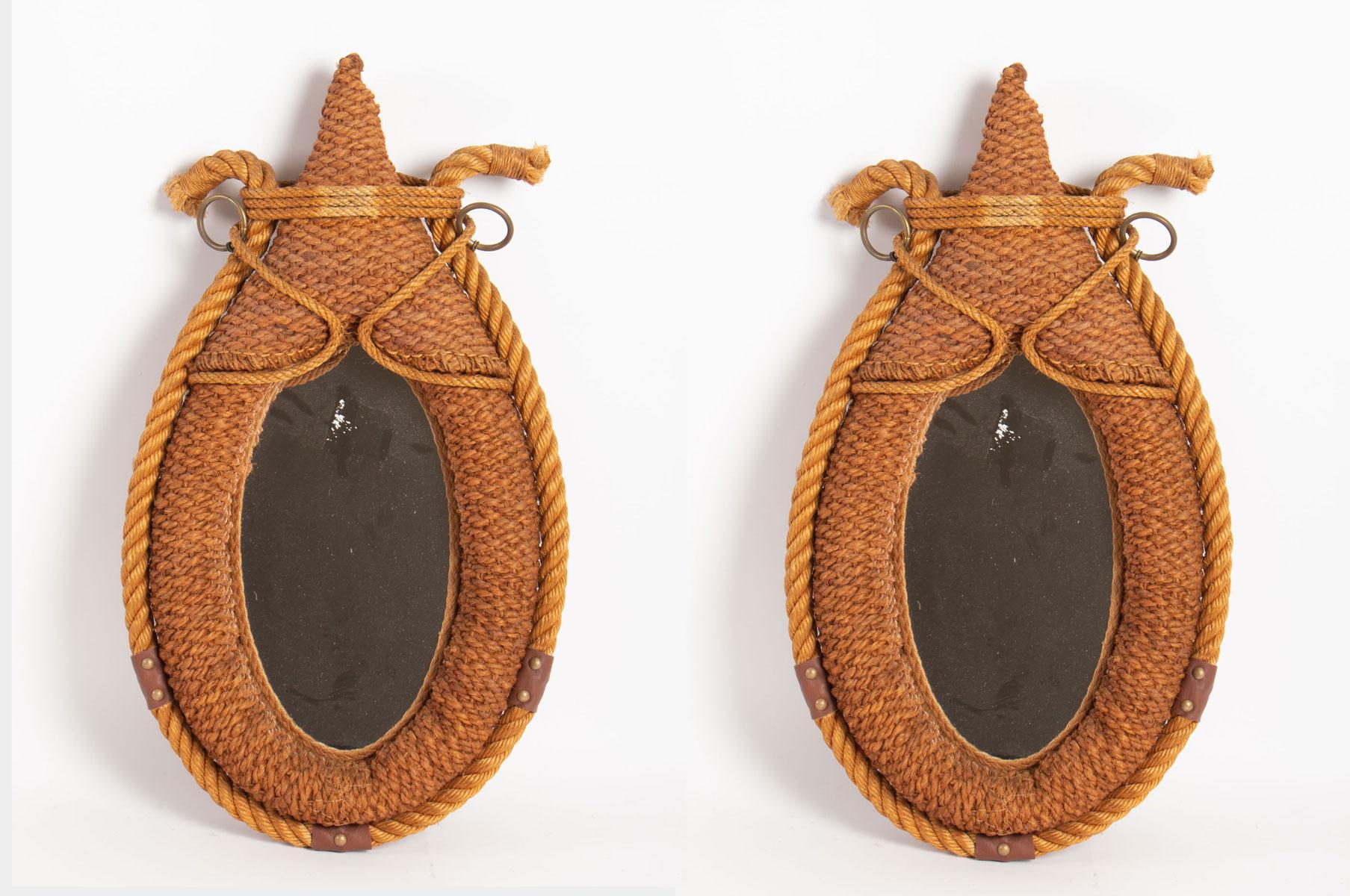 Spectacular pair of wall mirors, by Adrien Audoux and Frida Minet, France, 1950s
knotted and braided rope.