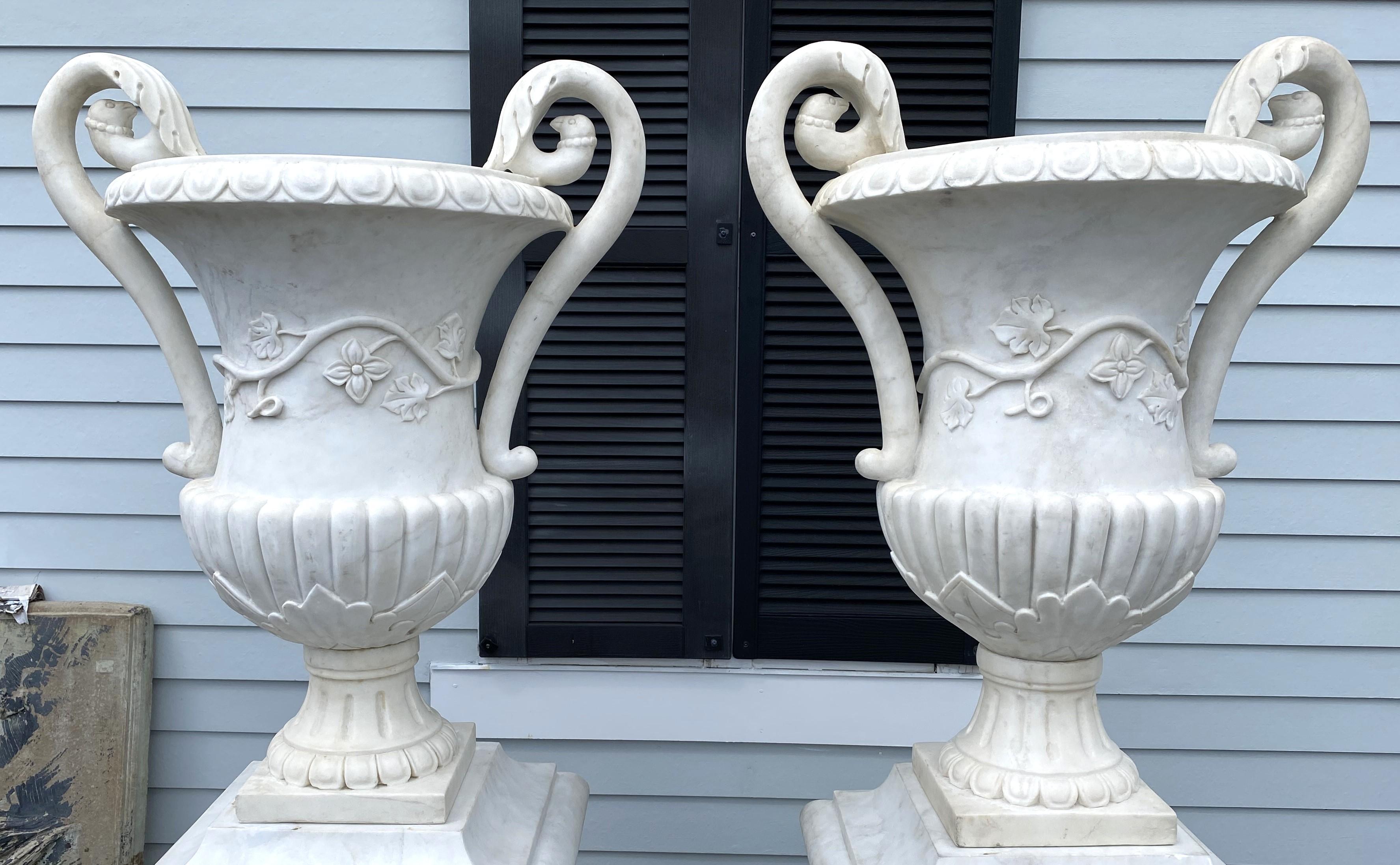 Classical Roman Spectacular Pair of White Marble Classic Form Handled Urns w/ Baluster Pedestals For Sale
