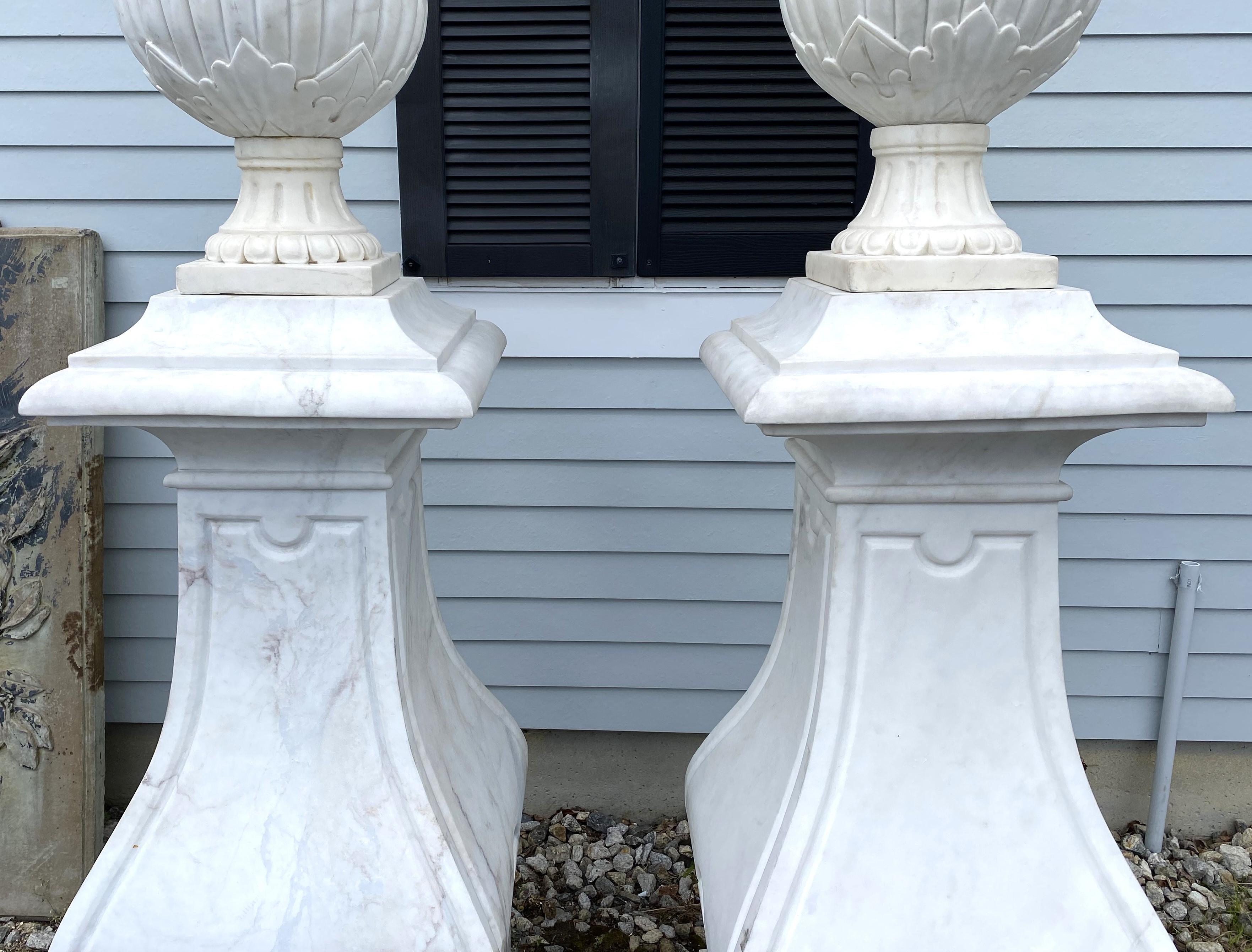 Unknown Spectacular Pair of White Marble Classic Form Handled Urns w/ Baluster Pedestals For Sale