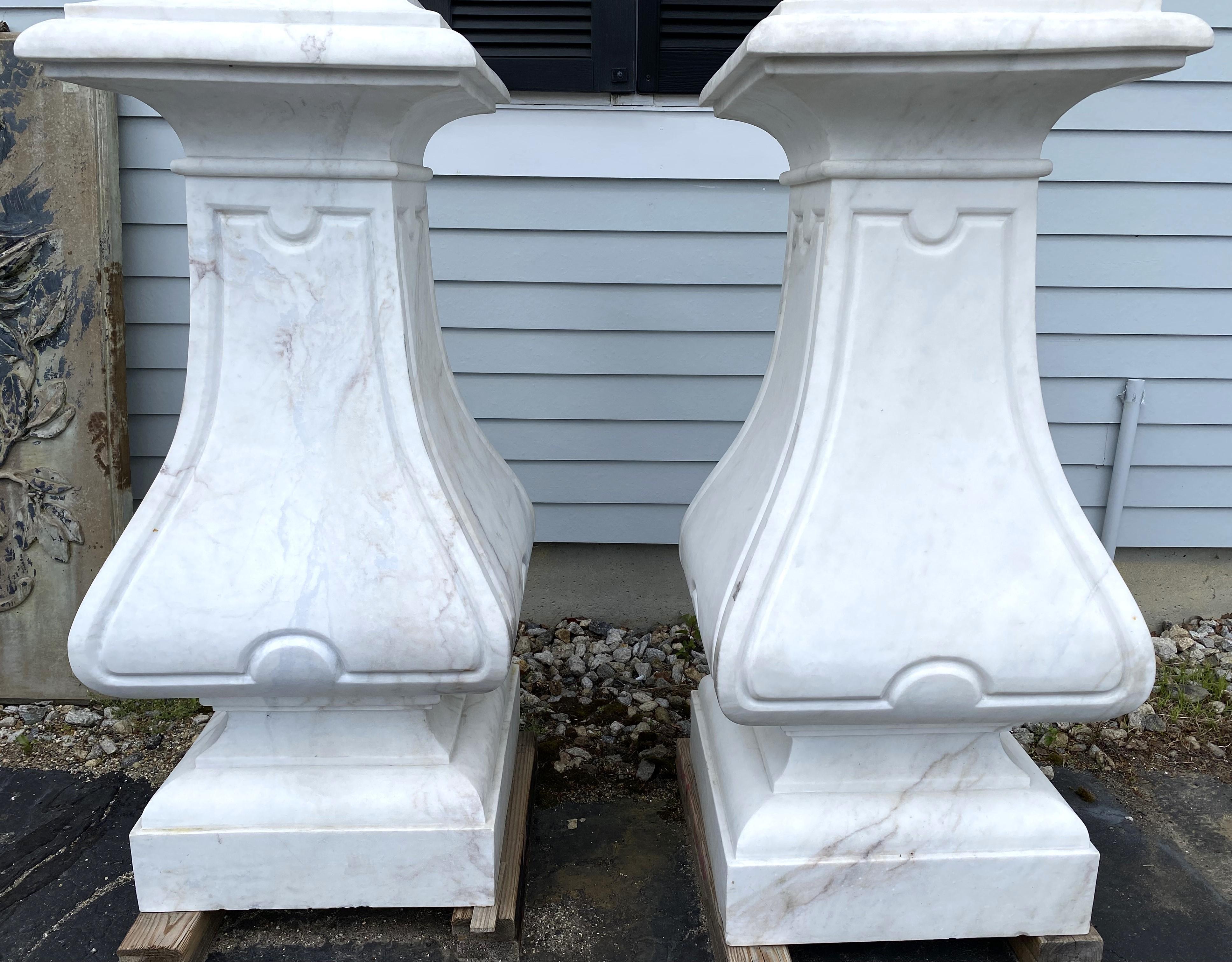 Hand-Carved Spectacular Pair of White Marble Classic Form Handled Urns w/ Baluster Pedestals For Sale