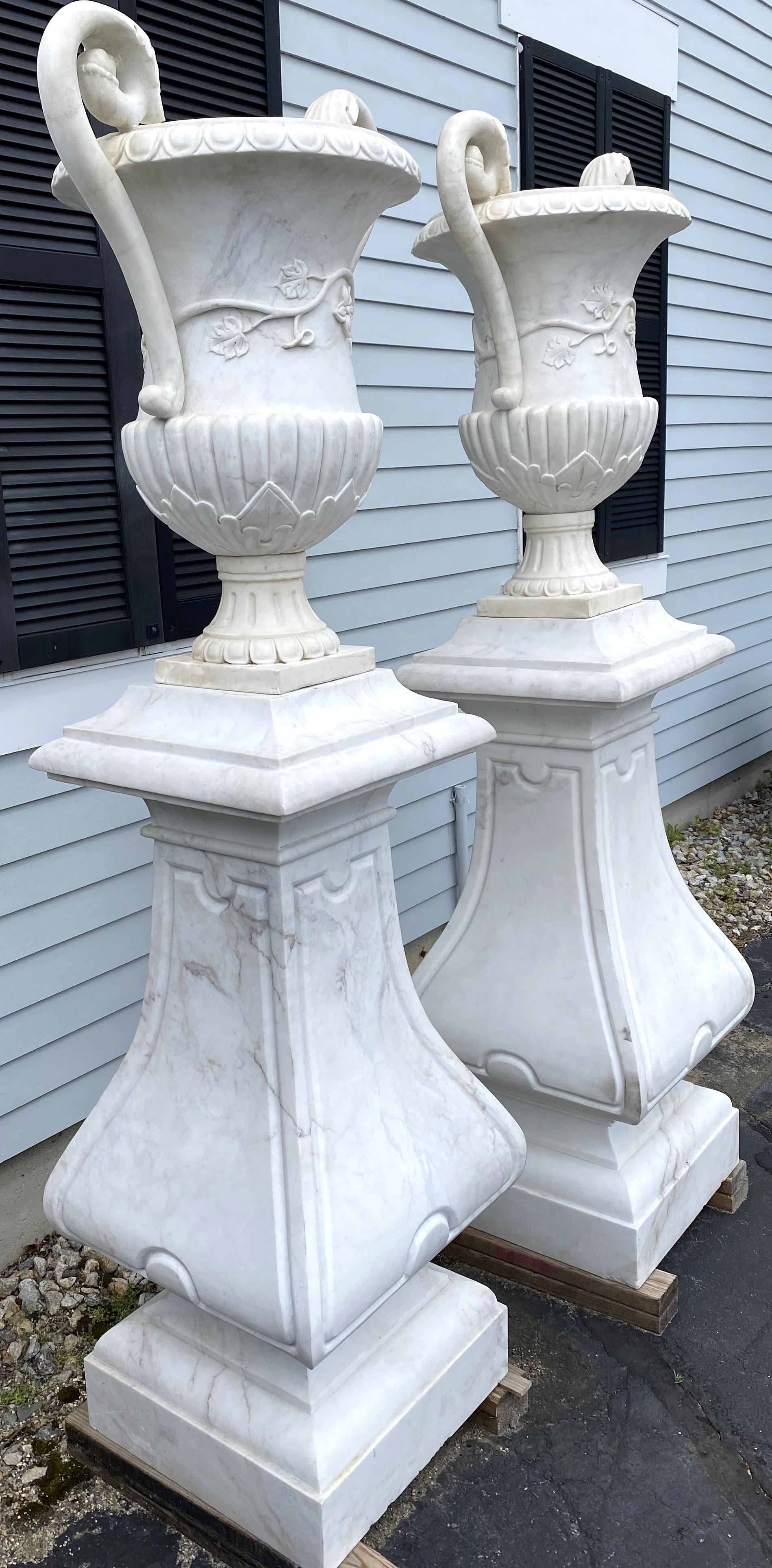 Spectacular Pair of White Marble Classic Form Handled Urns w/ Baluster Pedestals In Good Condition For Sale In Milford, NH