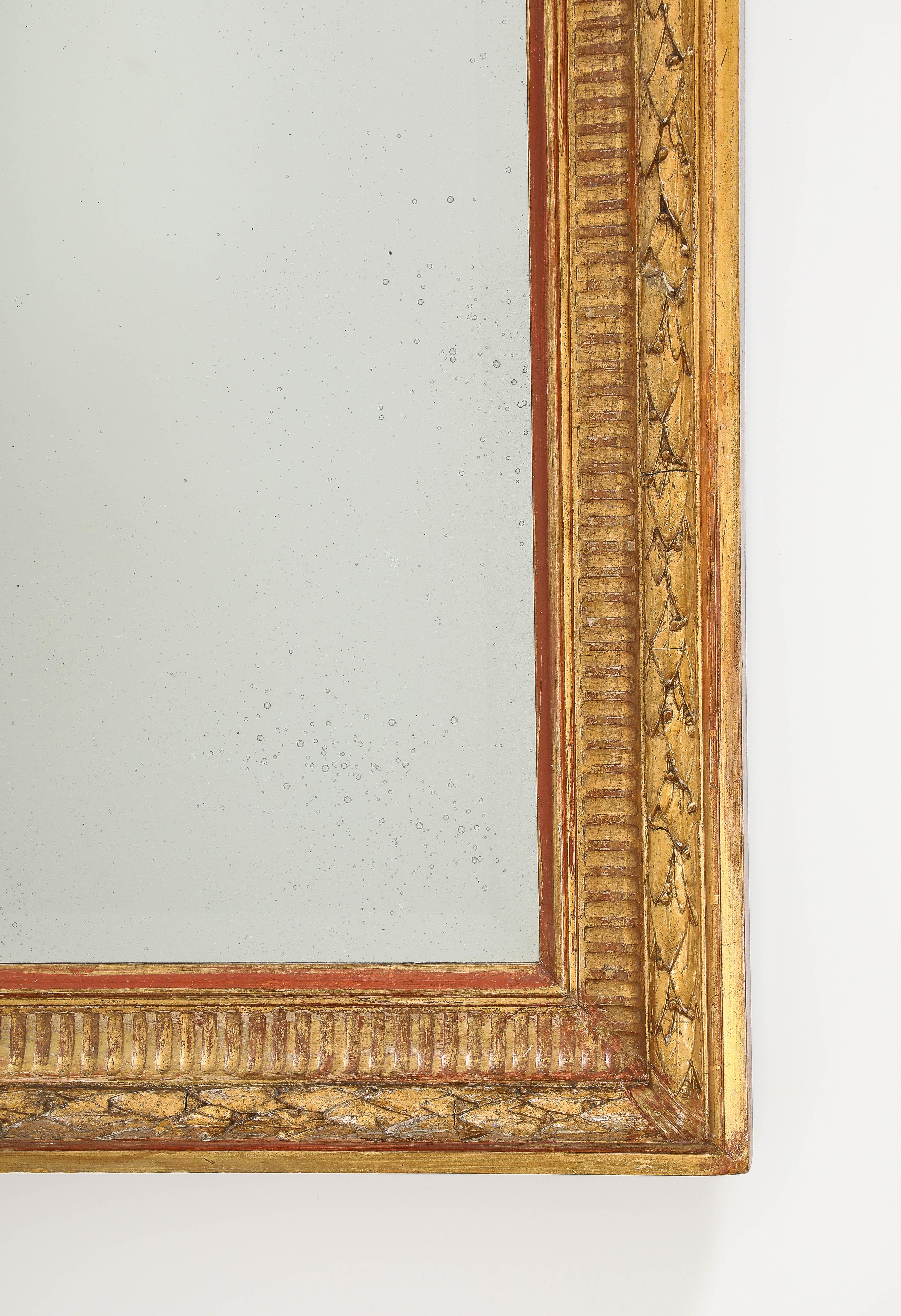 Foglia d’oro Spettacolare specchio in legno dorato intagliato italiano del XIX secolo. in vendita