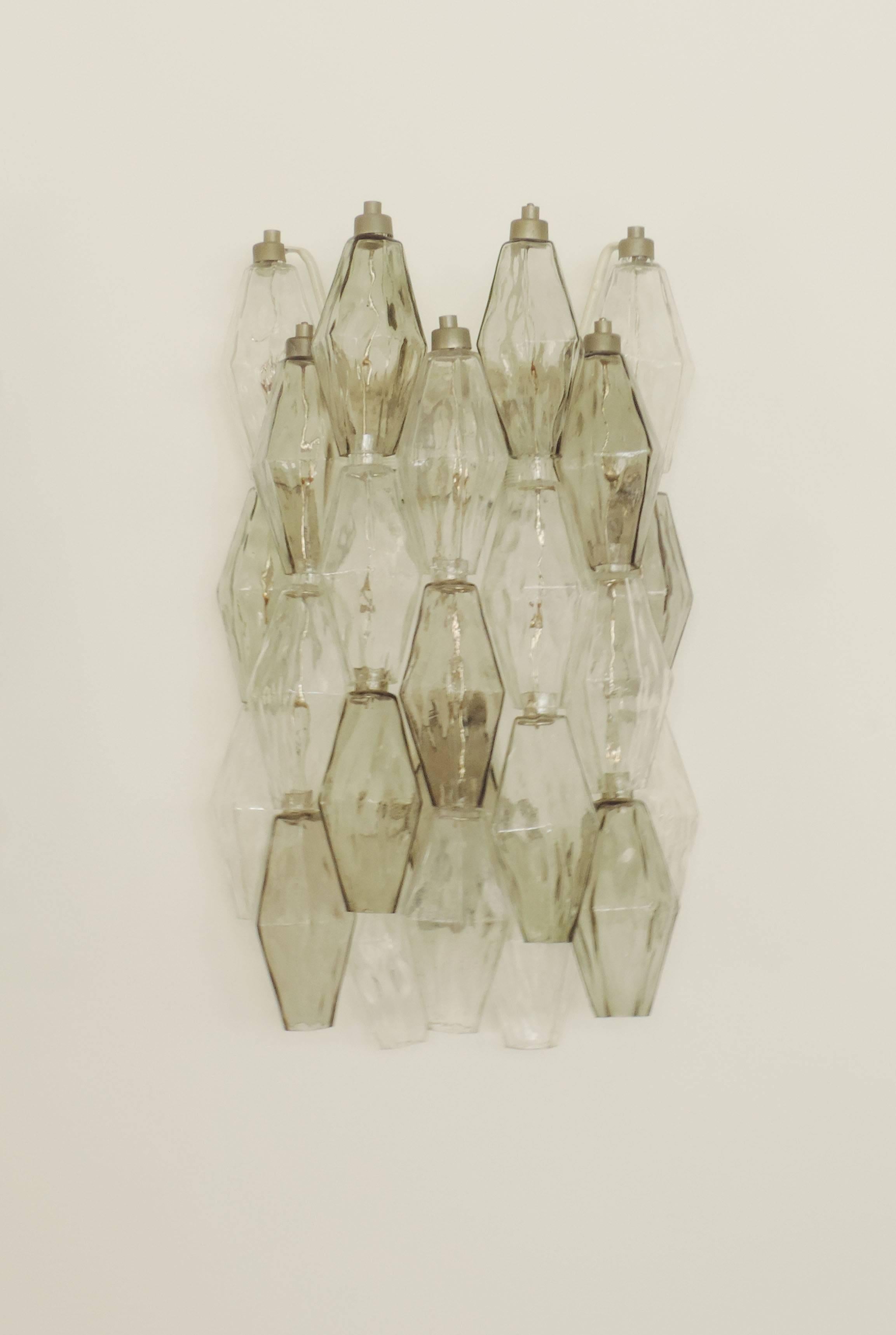 Spectacular set of four Carlo Scarpa Poliedri wall sconces for Venini
Grey and transparent glass.