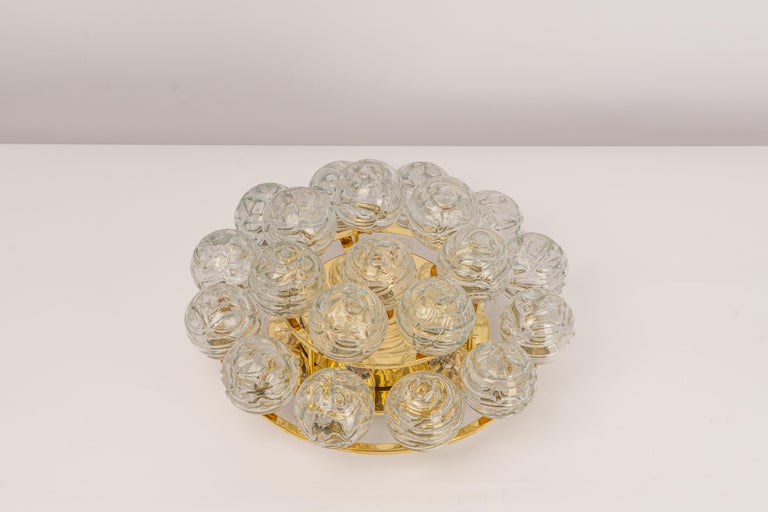 Spectacular Sputnik flush mount with Murano glass snowballs designed by Doria, Germany, 1970s
All Murano glass balls are in very good condition.

Heavy quality and in very good condition. Cleaned, well-wired and ready to use.
It requires 6 x E14