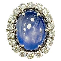 Spectaculaire bague en platine avec saphir étoilé et diamant