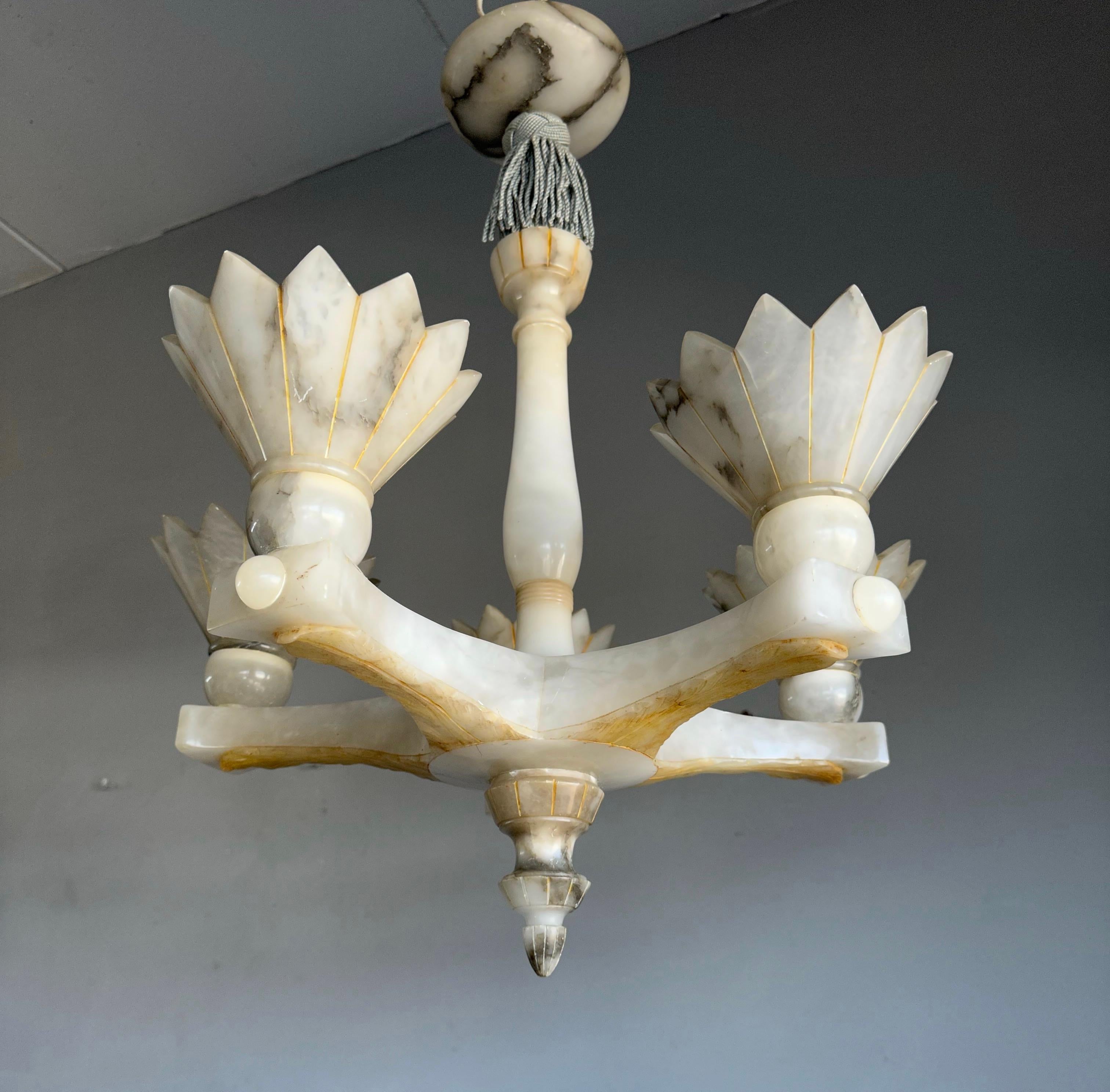 Early 20th century, majestic, pure Art Deco, work-of-art light fixture.

With early 20th century lighting in general (and alabaster fixtures in particular) as one of our specialities, we were again amazed to find a completely unique and highly