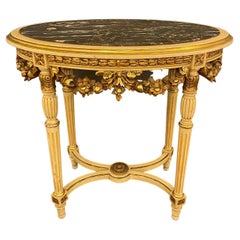 A Louis XVI Style Marble Topped Gilt-Wood Centre Table, circa 1890s
