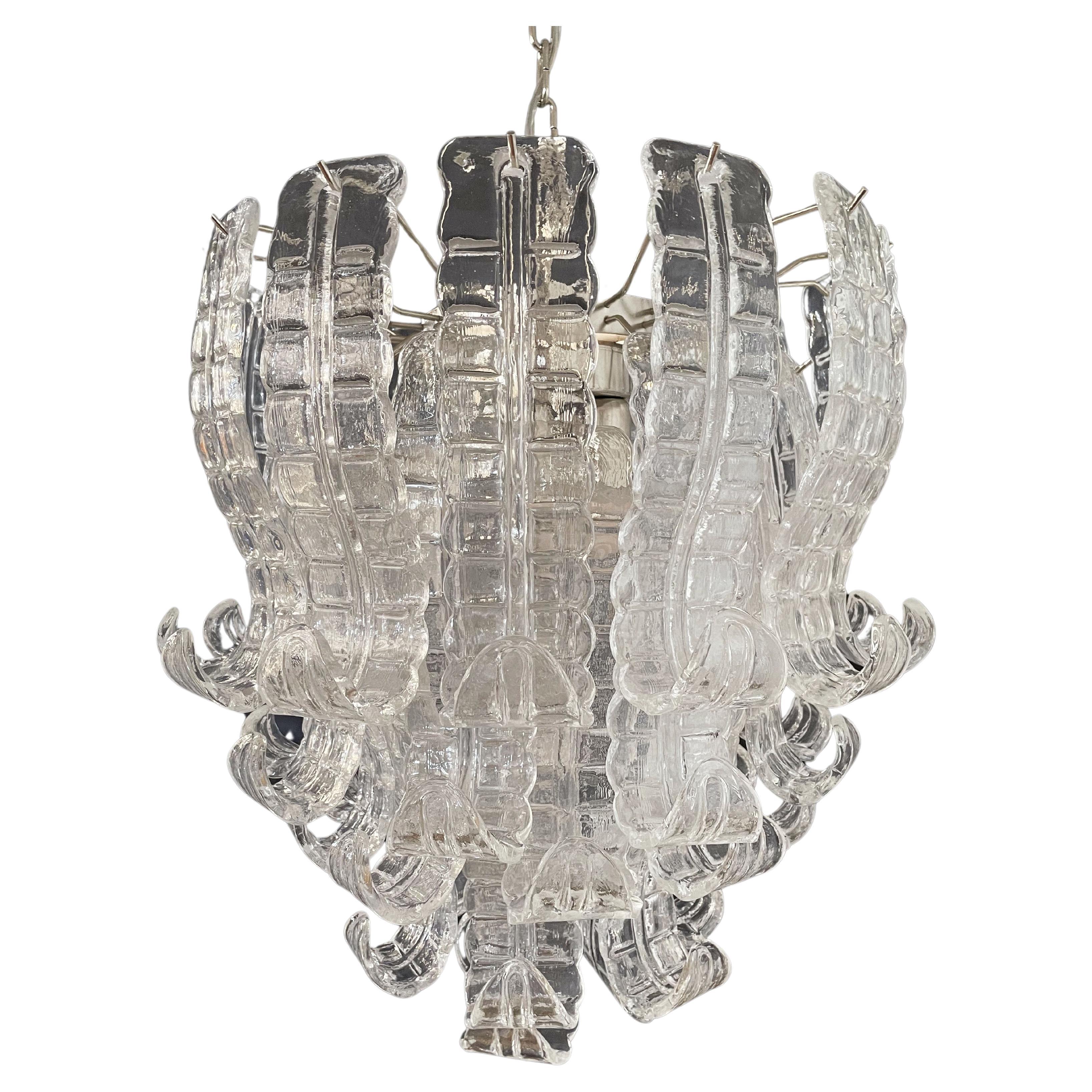 	Beautiful and huge Italian Murano Chandelier composed of 41 splendid trasparent glasses that give a very elegant 
	look. 
	Period:	1970's
	Dimensions: 	48,40 inches (123 cm) height with chain; 21,65 inches (55 cm) height without chain; 22,45 inches