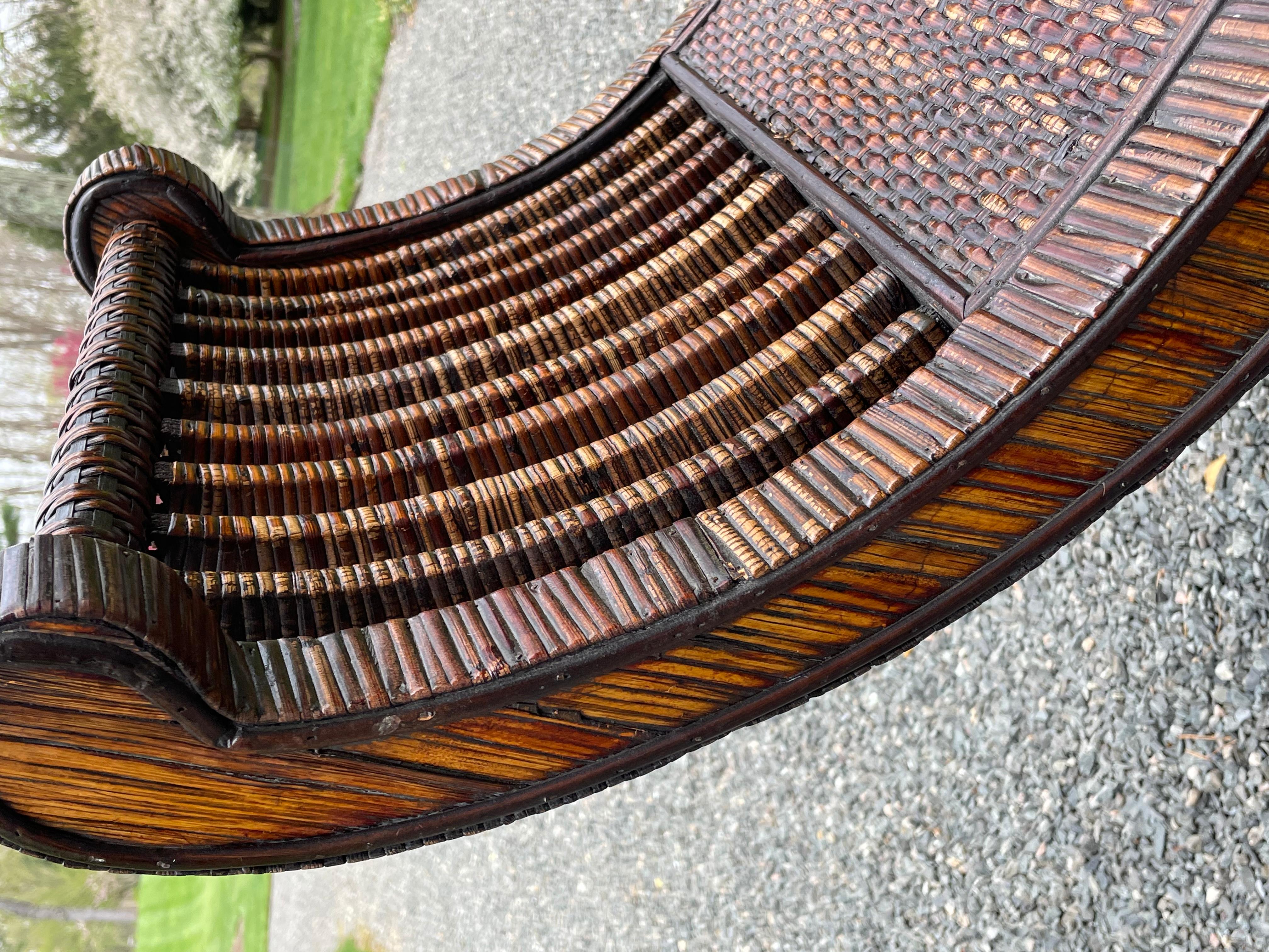Vintage split bamboo bench with super stylish high sides and curved shape. Wonderful patina and sturdy.