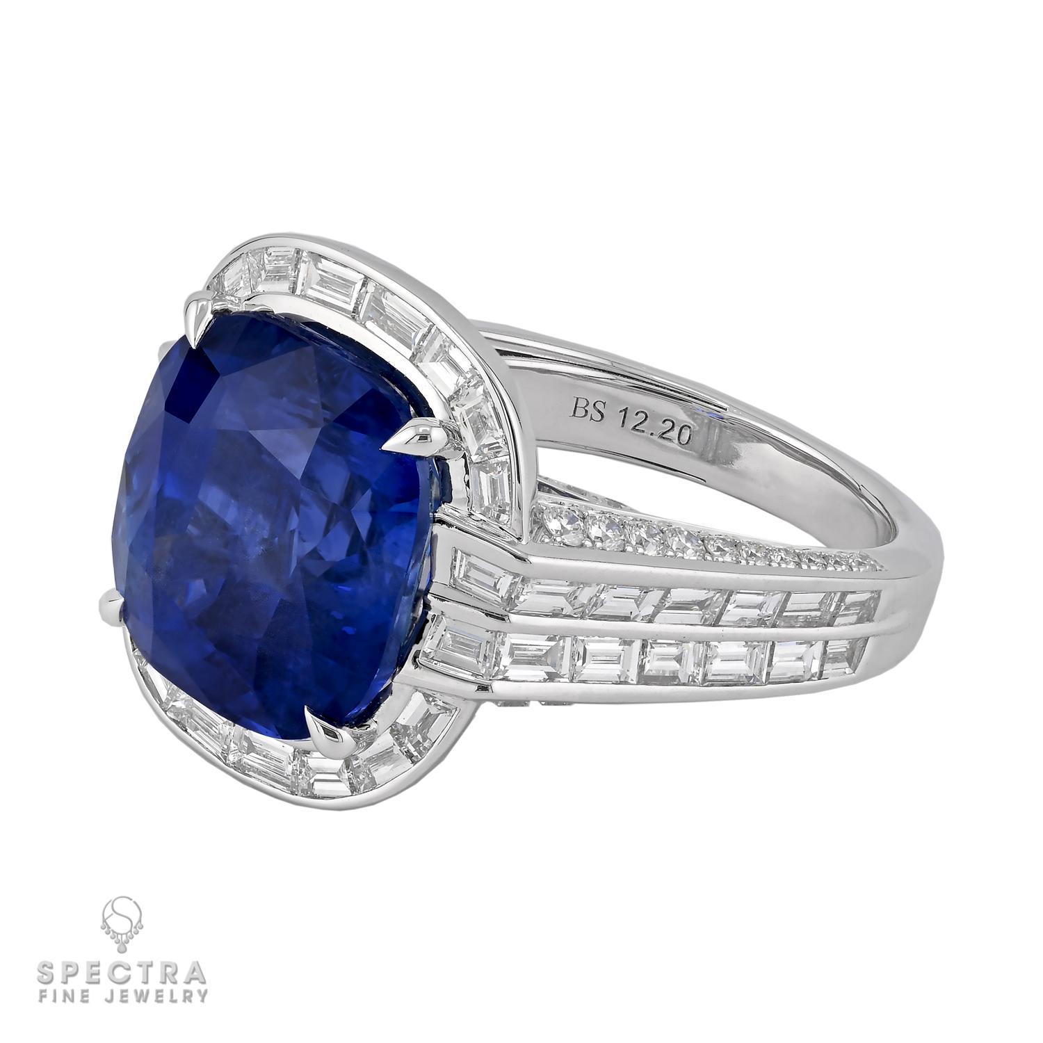 This elegant ring showcases a breathtaking 12.20-carat cushion-cut Ceylon sapphire, certified by AGL for its natural, unheated beauty. The deep blue hue of the sapphire is complemented by 2.33 carats of sparkling diamonds, all set in polished 18kt