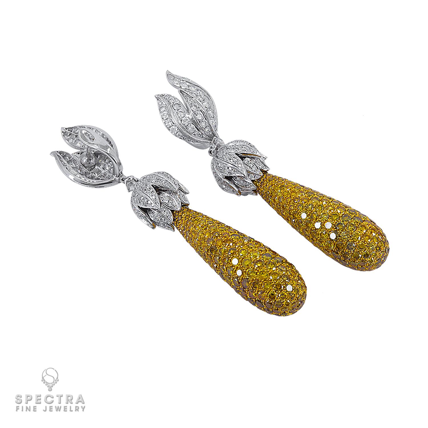 If there were a stylized, jeweled depiction of the great The Winged Victory of Samothrace, a masterpiece of Greek Hellenistic art and one of the most famous sculptures at the Louvre, these White and Yellow Diamond Drop Earrings with an estimated