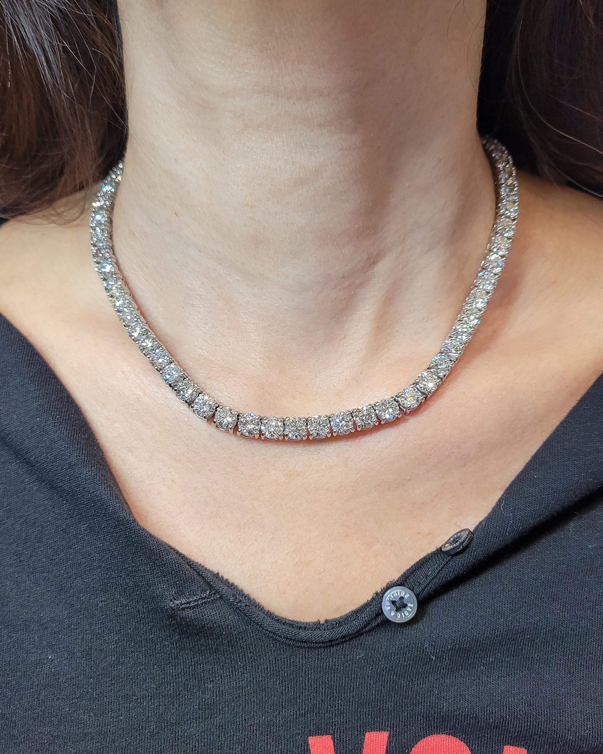 A beautiful tennis necklace comprising of 68 round diamonds weighing a total of 47.60 carats, approximately 0.7 carat each. 
The diamonds are natural with H-I colors, VS-SI clarity. Not certified.
Metal is 14kt white gold, gross weight 54.96