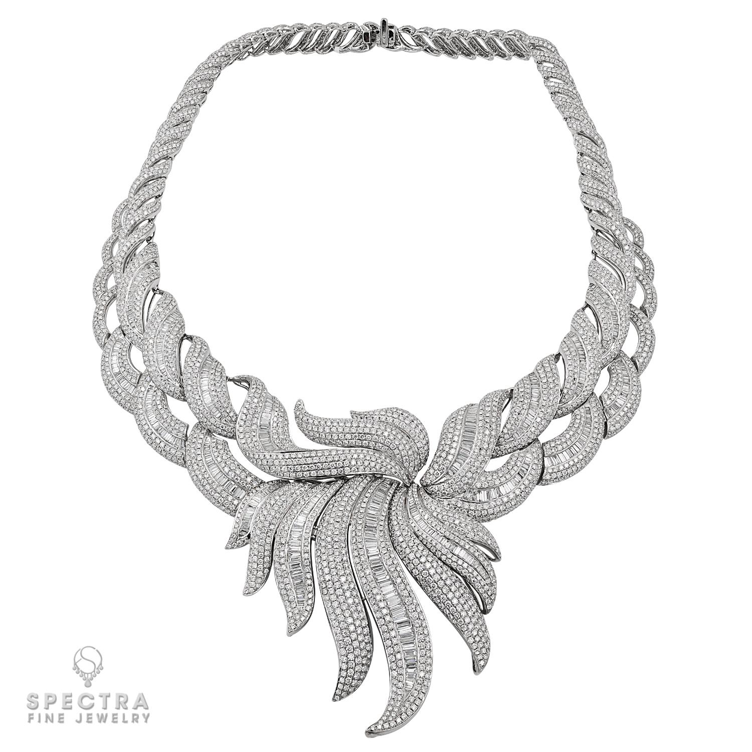 This Spectra Fine Jewelry necklace boasts a stunning combination of 37.82 carats of round-cut and 11.04 carats of baguette-cut diamonds, set in a luxurious blend of platinum and 18kt white gold. The necklace weighs 183.08 grams and features a