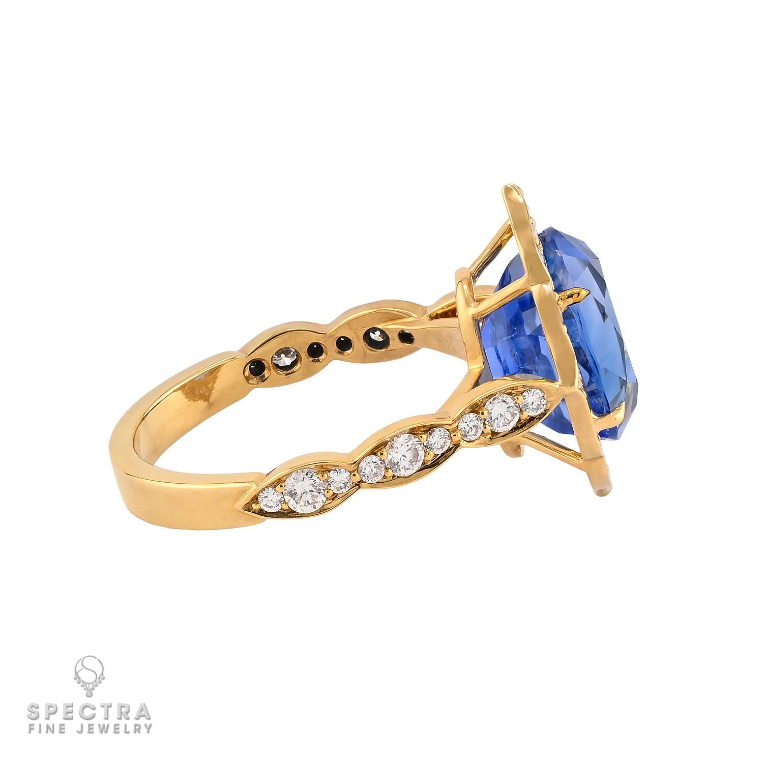 A timeless classic with a bold splash of color—this striking ring centers on a magnificent 6.00 carat oval Ceylon sapphire, certified by GRS as unheated, showcasing its natural beauty and coveted origin. The sapphire’s vivid blue hue is elegantly