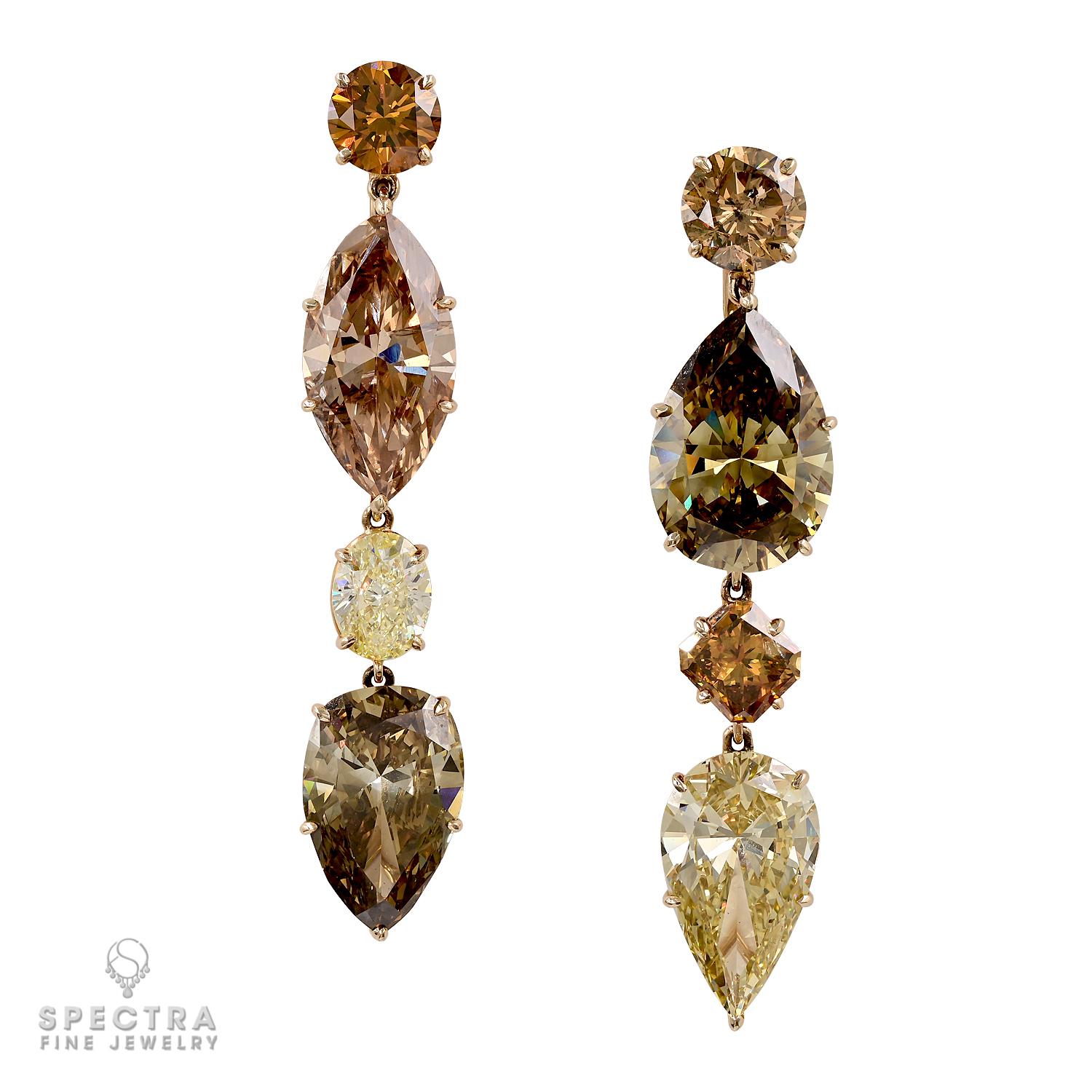 A breathtaking display of color, balance, and craftsmanship, these 61.20-carat Fancy Colored Diamond Drop Earrings made by Spectra Fine Jewelry are a masterpiece of bold elegance. Composed of GIA-certified diamonds in a symphony of rich, earthy