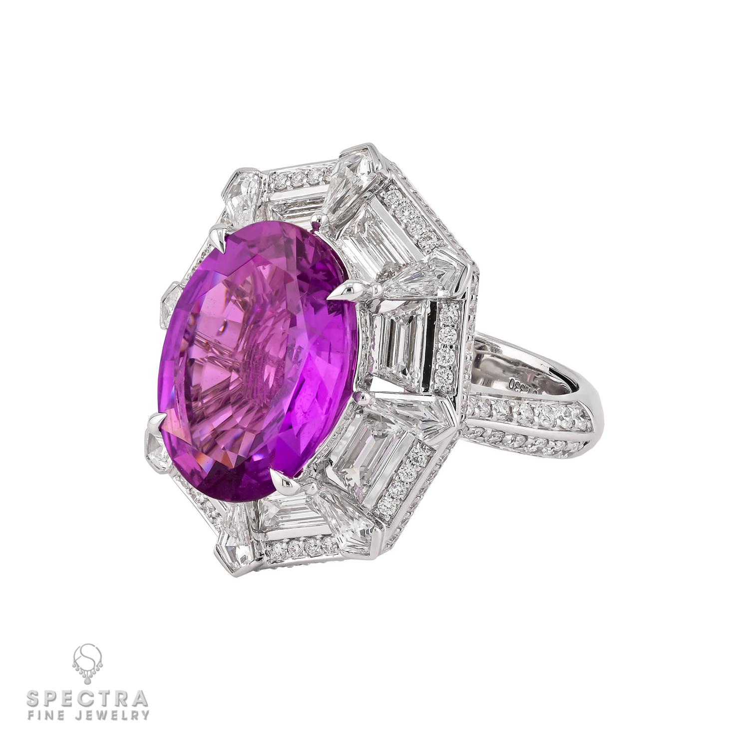 A vision of elegance and rarity, this exquisite 7.33-carat oval pink sapphire ring by Spectra Fine Jewelry captivates with its mesmerizing hue. Sourced from Madagascar, the unheated sapphire boasts a rich, natural color that radiates pure