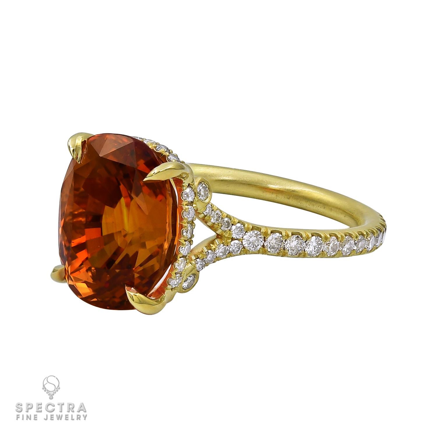 A gorgeous ring embellished with a cushion-shape sapphire of the rare orange color weighing a total of 7.88 carats.
Accompanied by the certificate from AGL, stating that it's of Sri Lankan origin with the clarity enhancement (heated).
The sapphire