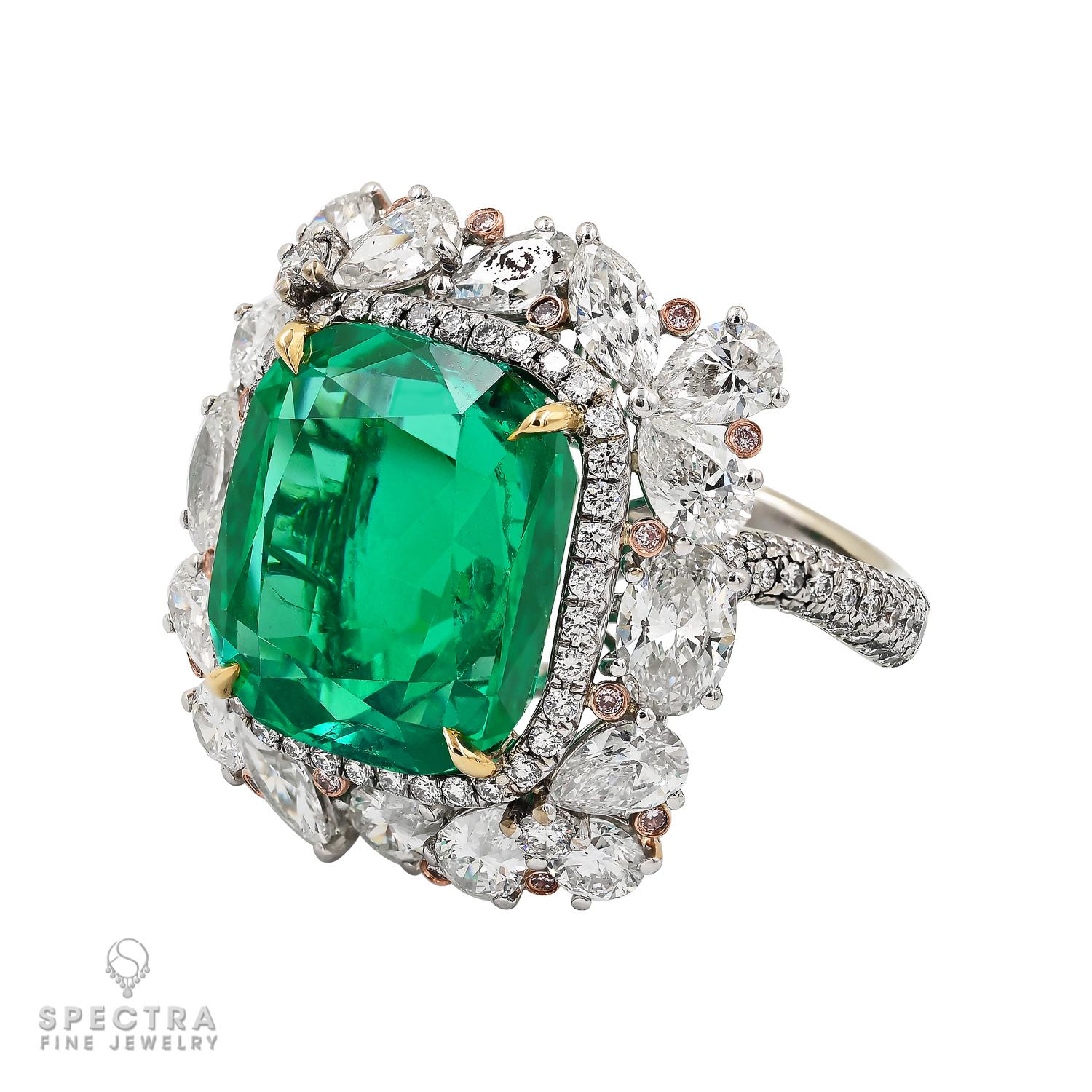 Introducing an extraordinary statement piece: the 11.30-carat Colombian Emerald Diamond Cocktail Ring. At its center shines a magnificent 11.30-carat emerald-cut Colombian Emerald, adorned with a diamond halo, certified by AGL.
This captivating