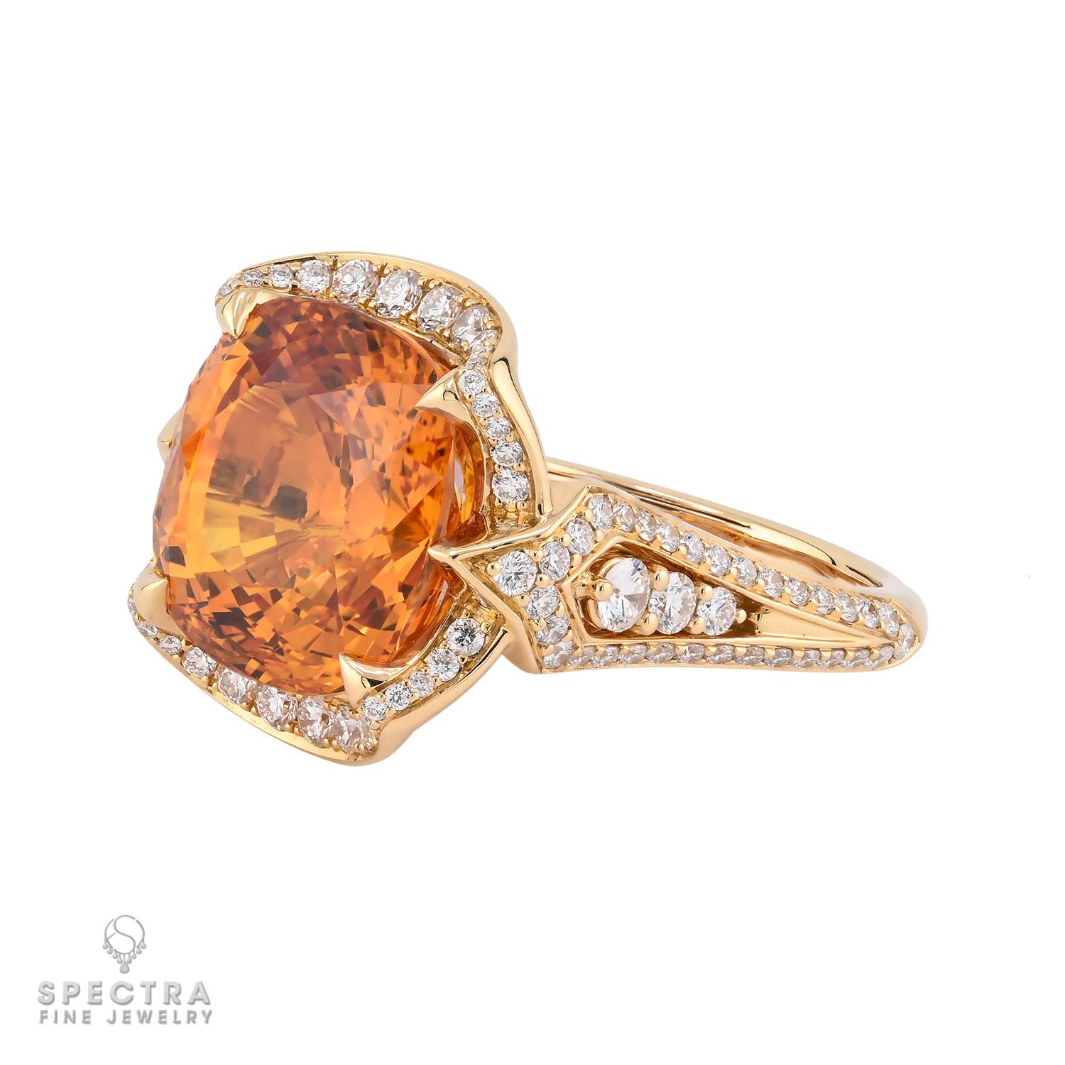 This exquisite 11.63-carat Orange Sapphire Diamond Ring by Spectra Fine Jewelry radiates elegance and vibrant charm. The mesmerizing cushion-cut Ceylon orange sapphire, certified by AGL, has undergone expert heating to enhance its captivating color.
