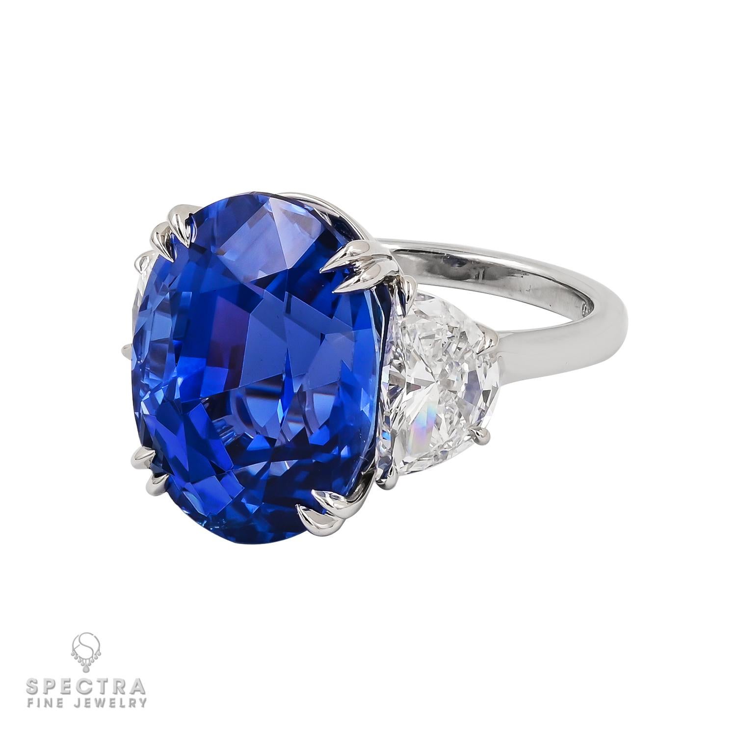 Embrace the epitome of luxury and sophistication with this stunning 20.63-carat Ceylon Sapphire Diamond Ring. Exquisitely crafted, this masterpiece showcases a captivating oval Ceylon blue sapphire, certified by AGL with no indication of thermal