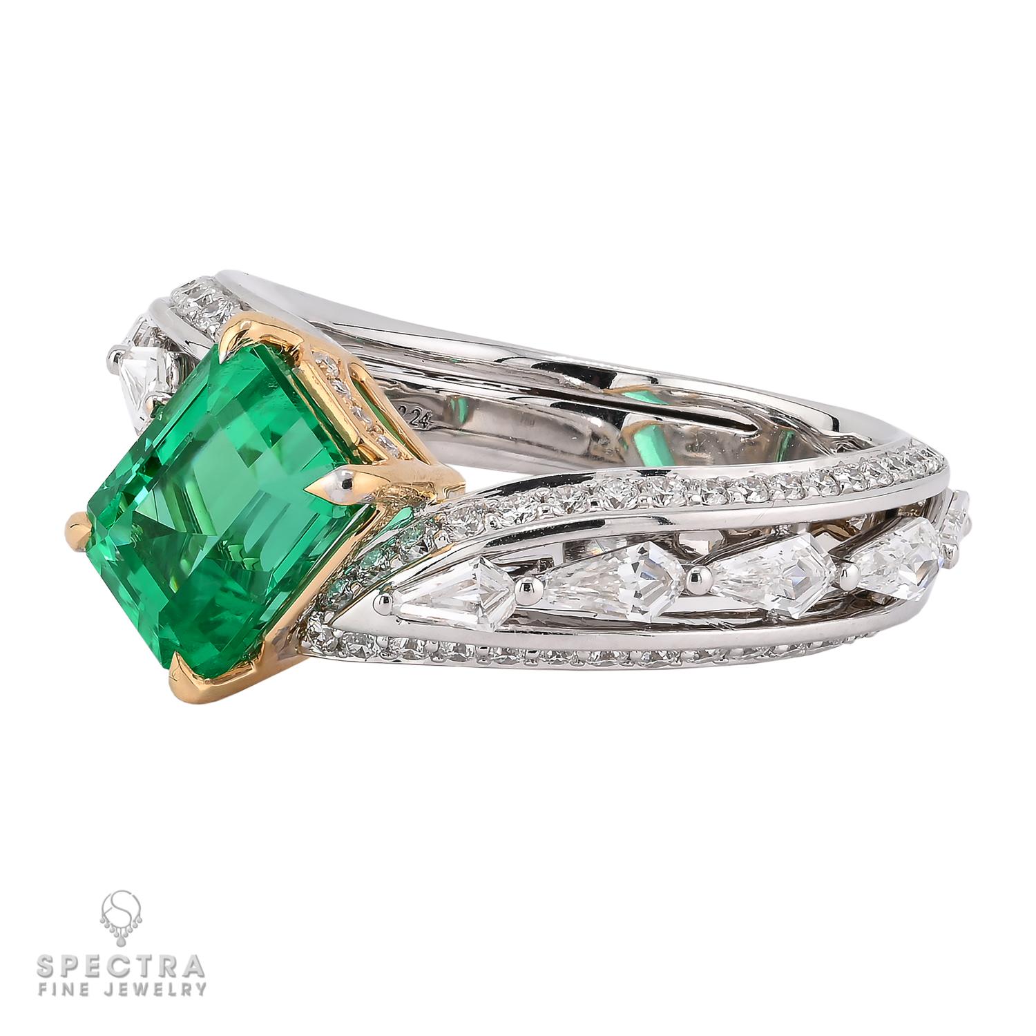 A true treasure of timeless elegance, this exquisite ring from Spectra Fine Jewelry features a captivating 2.24-carat Colombian emerald, certified by AGL as no oil (free of any treatments). The emerald's vivid green hue is perfectly complemented by
