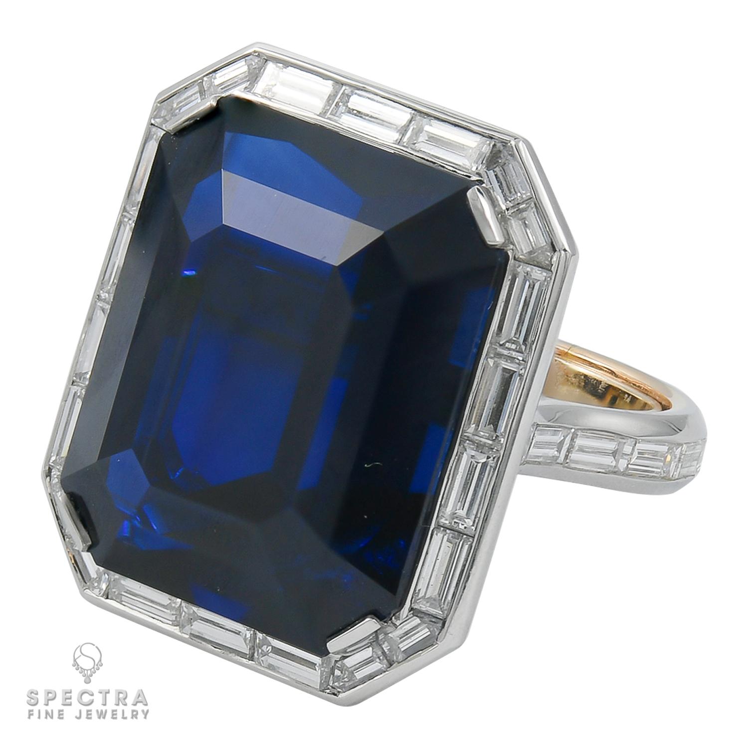 A statement cocktail ring, showcasing an emerald-cut Basaltic blue sapphire weighing a total of 37.13 carats. The sapphire is certified by Gubelin lab, stating that it's Basaltic with no indication of heating. Basaltic sapphires are known to be