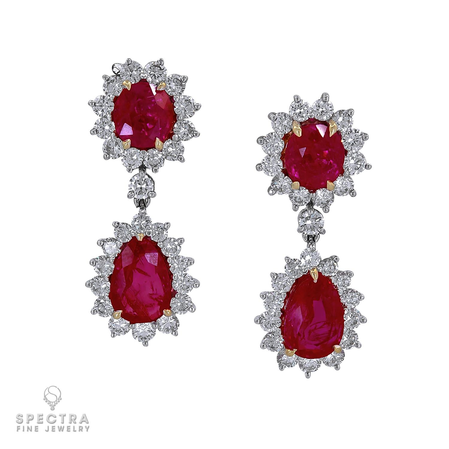 A beautiful pair of earrings adorned with 2 oval and 2 pear shape pinkish-red rubies. 
All rubies are certified by the AGTA and GRS Labs with the reports, stating that the rubies are unheated Burmese, pinkish-red color.

Total weight of rubies is