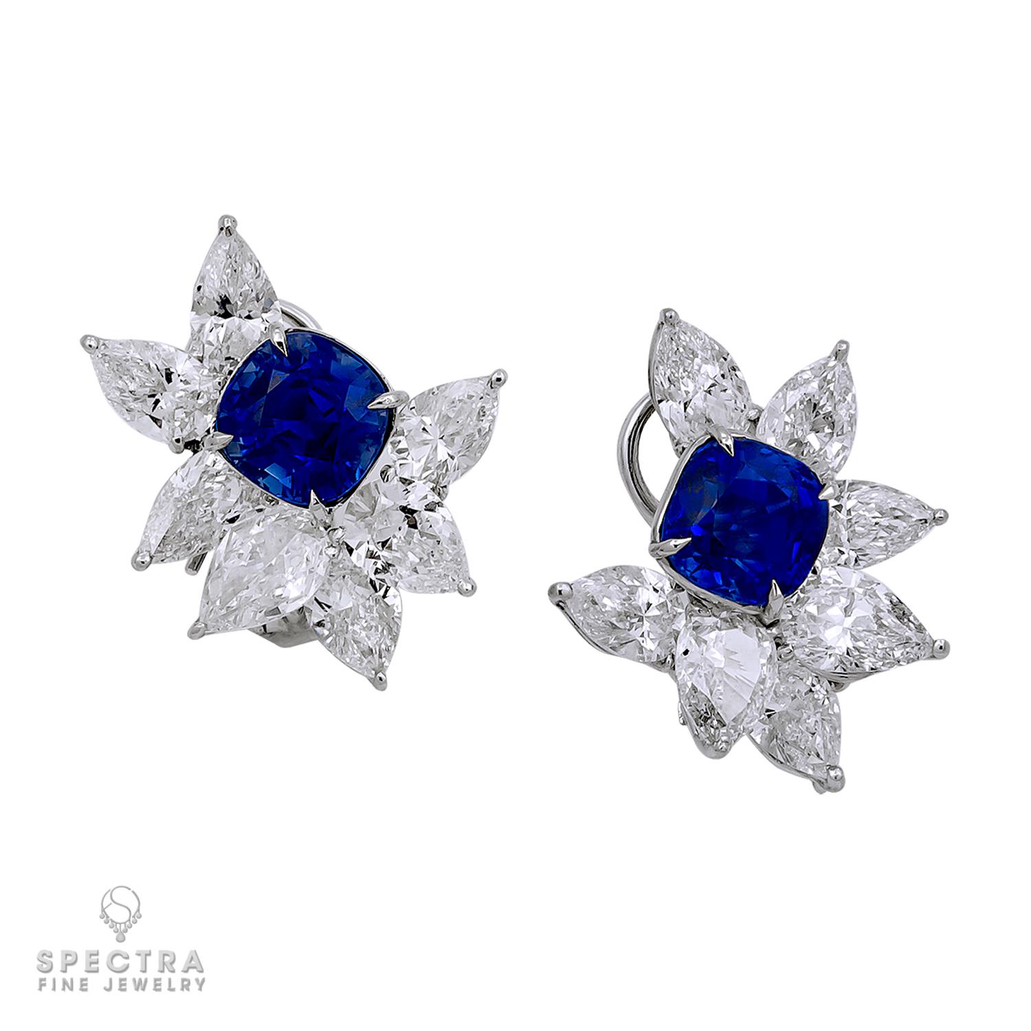 Introducing our exquisite Cluster Earrings, a breathtaking embodiment of timeless elegance and rare sophistication. These earrings feature a mesmerizing pair of Kashmir sapphires, renowned for their coveted 'cornflower' blue hue and velvety texture,