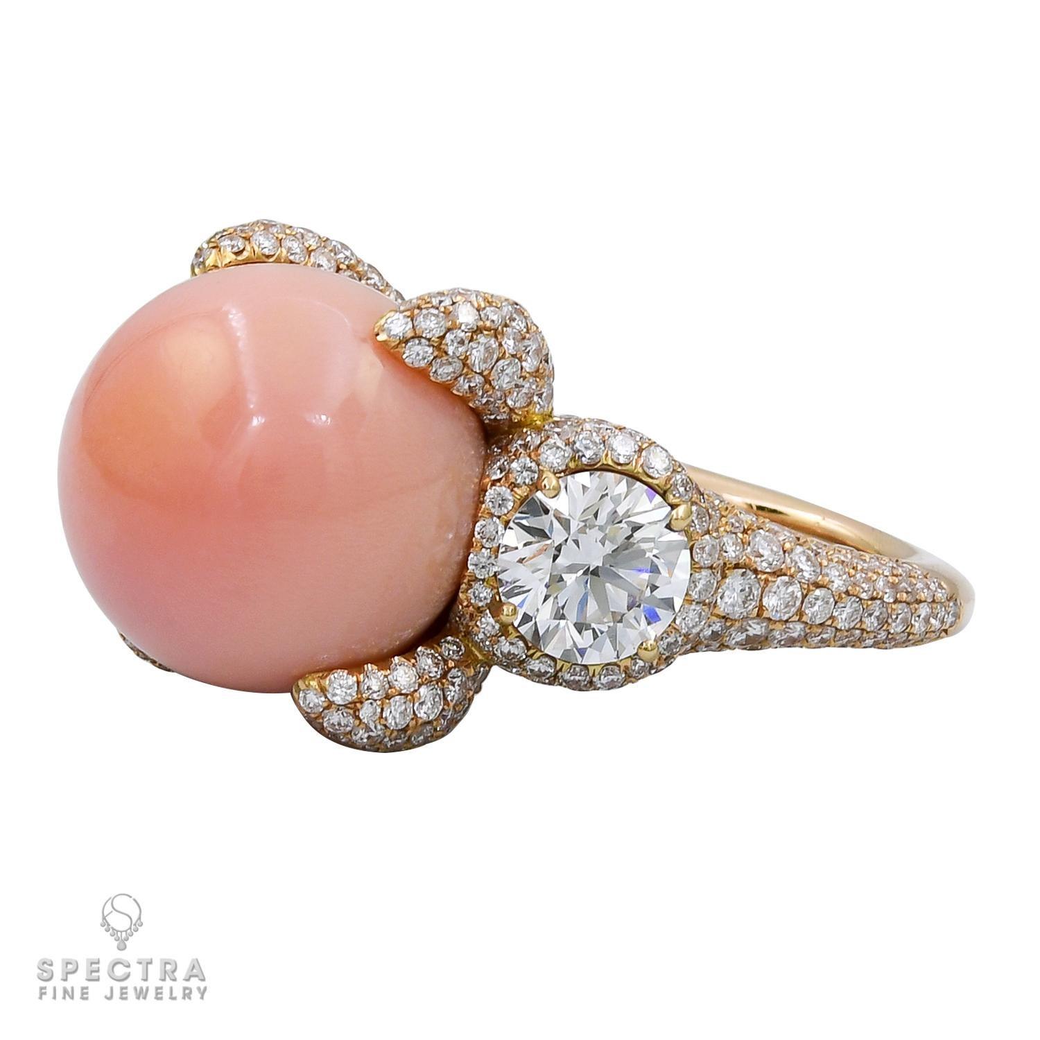 The Conch Pearl Diamond Cocktail Ring, made by Spectra Fine Jewelry, is a captivating piece that seamlessly blends elegance with contemporary design. This stunning ring features a harmonious combination of rare elements, showcasing a magnificent