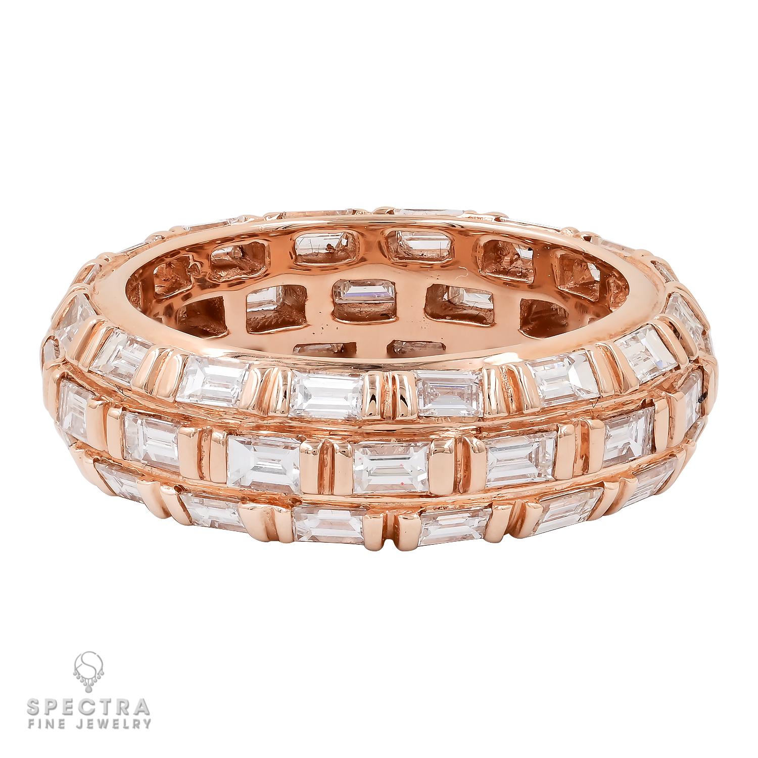 Introducing an exquisite symbol of eternal love: the Diamond Rose Gold Wedding Band. Crafted with precision, this stunning piece is adorned with a total of 2.24 carats of emerald-cut diamonds, meticulously set in lustrous 18k rose gold. The diamonds