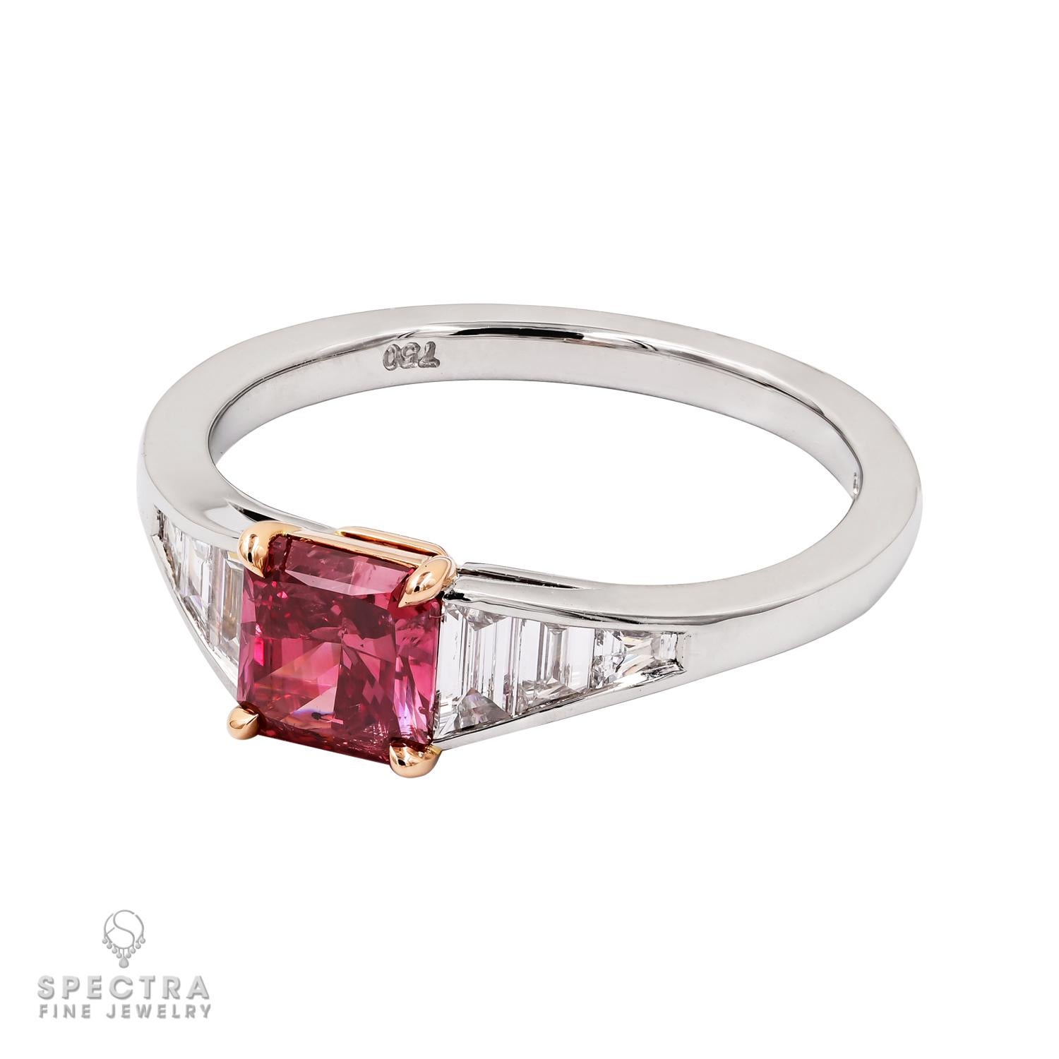0.76ct Radiant Red Diamond Ring by Spectra Fine Jewelry, an exquisite testament to the extraordinary beauty of nature's rarest treasures. Graced by a resplendent 0.76ct RAD Fancy Red Diamond, accompanied by a prestigious GIA certificate, this ring