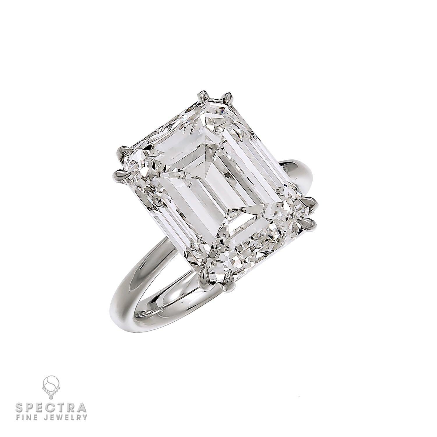 This extraordinary platinum ring features a stunning 10.32-carat emerald-cut diamond, certified H color and VS2 clarity by the GIA. The diamond’s sophisticated cut enhances its brilliance, creating a mesmerizing display of light with every movement.