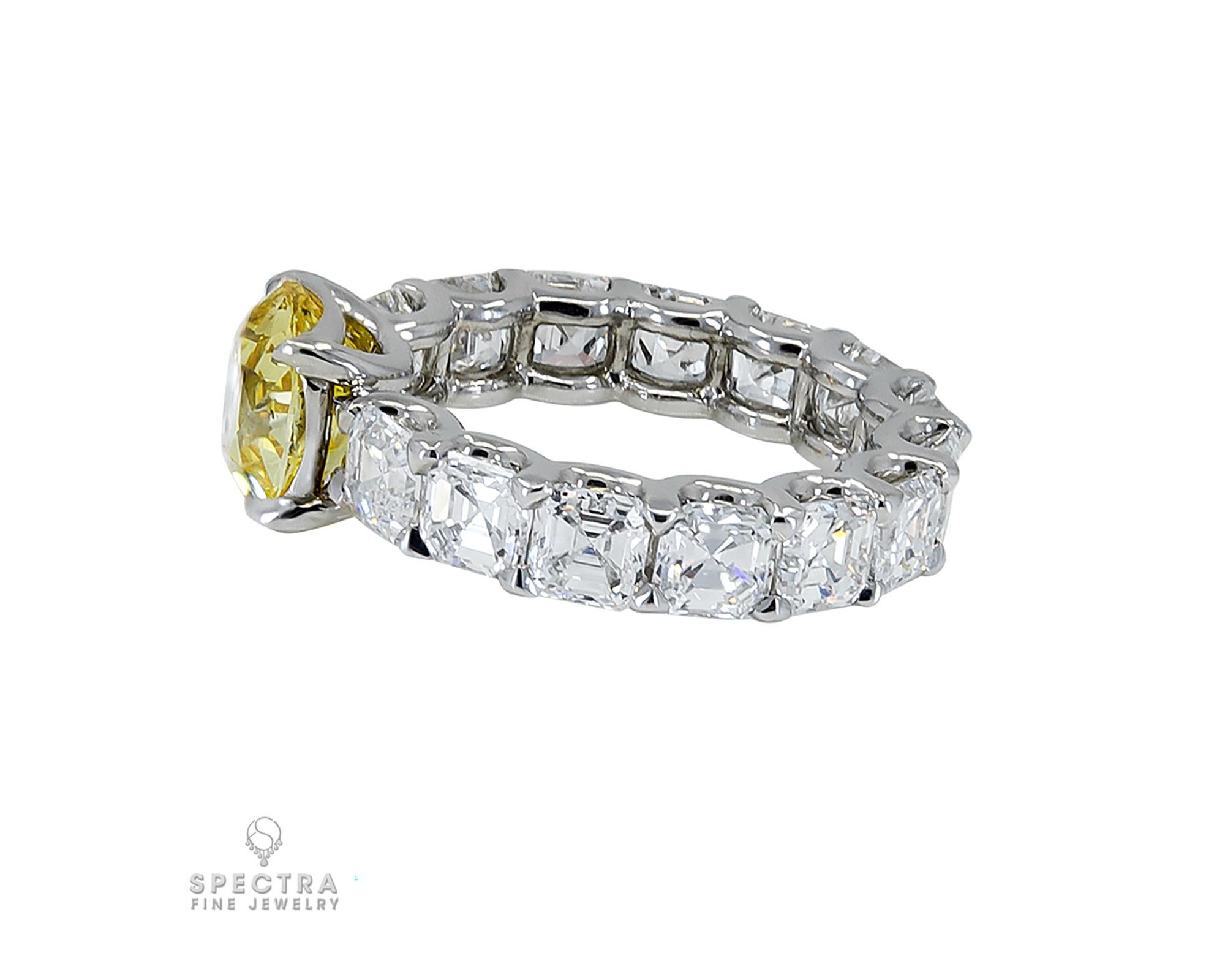 Radiant Cut Spectra Fine Jewelry GIA Certified 3.02 Carat Fancy Vivid Yellow Diamond Ring For Sale