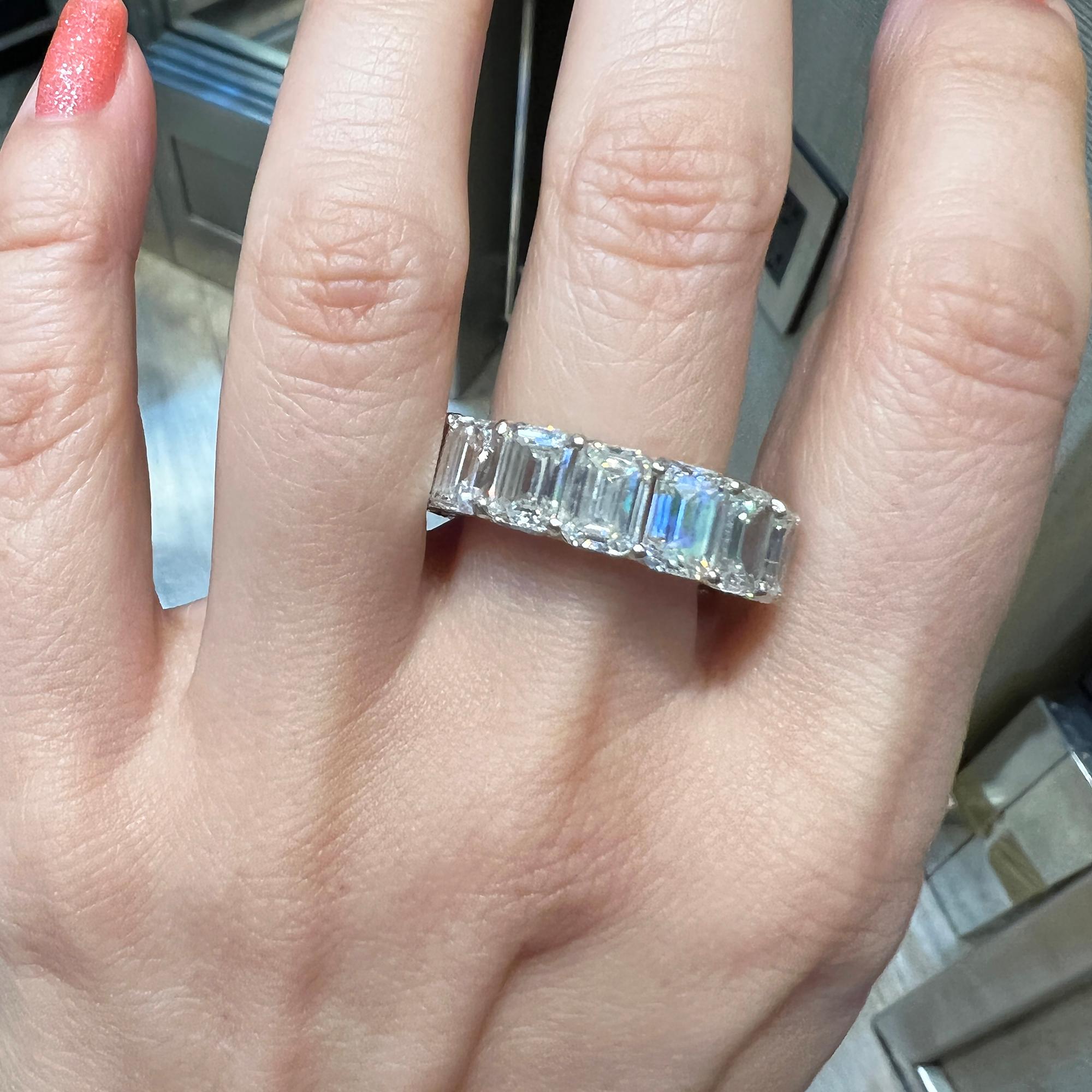 An eternity band comprising of 16 emerald-cut natural diamonds with H color, VVS2-SI1 clarity.
Total weight is 15.27 carats, 1 carat each. 
All diamonds are GIA certified.
Metal is platinum 12.46gr.
Size 8.5.