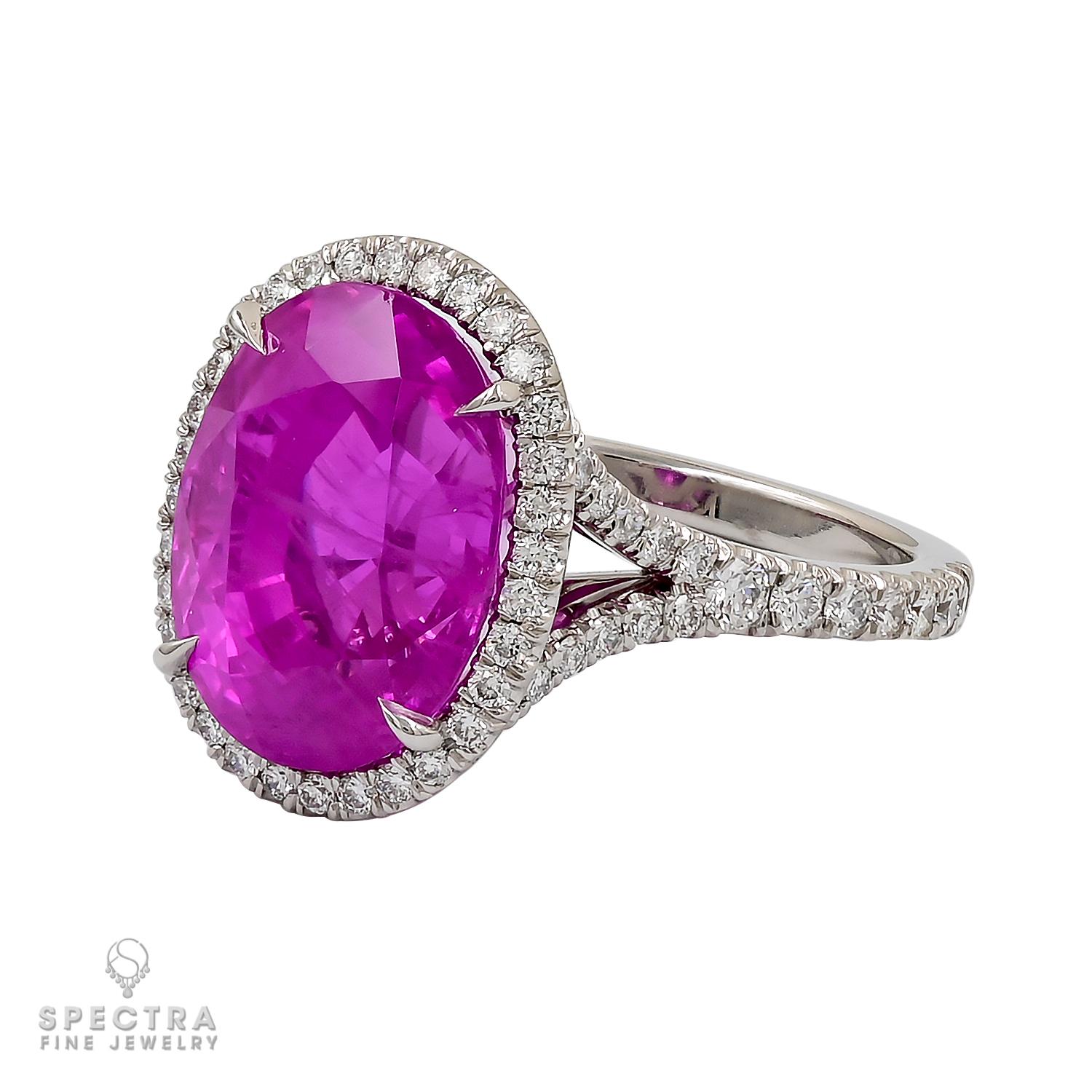 Experience timeless elegance with this exquisite 10.06 carat Oval Burma Pink Sapphire Diamond Ring. The center of attention is a mesmerizing oval-shaped, heated Pink Sapphire weighing a remarkable 10.06 carats. Certified by GRS, the GemResearch