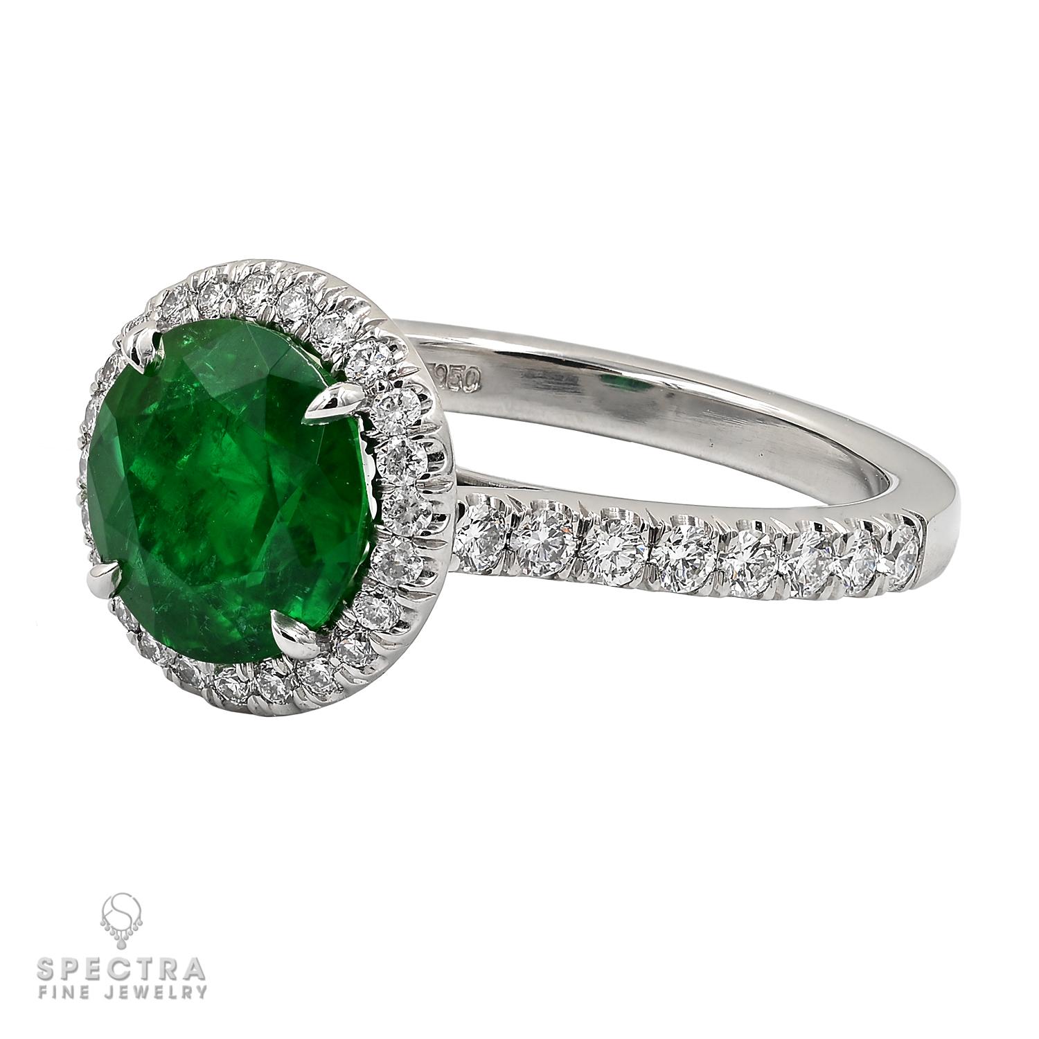 This 1.95-carat Round Emerald Diamond Ring is a true embodiment of timeless beauty.
At its center gleams a mesmerizing 1.95-carat round emerald, certified by GRS stating that it's of Himalayan origin with insignificant clarity