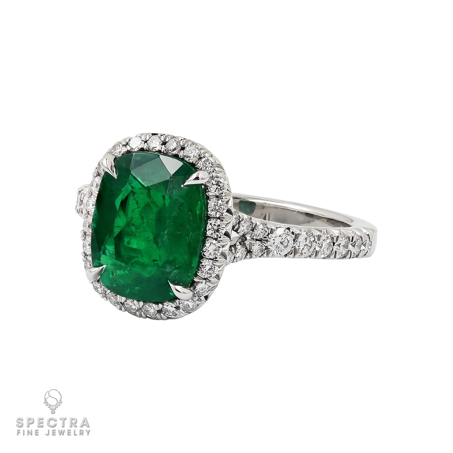 Embark on a journey of contemporary luxury and elegance with our 2.26-carat Cushion Colombian Emerald Diamond Ring — an exquisite piece of jewelry seamlessly marrying nature's brilliance with impeccable craftsmanship.
At its core, a resplendent