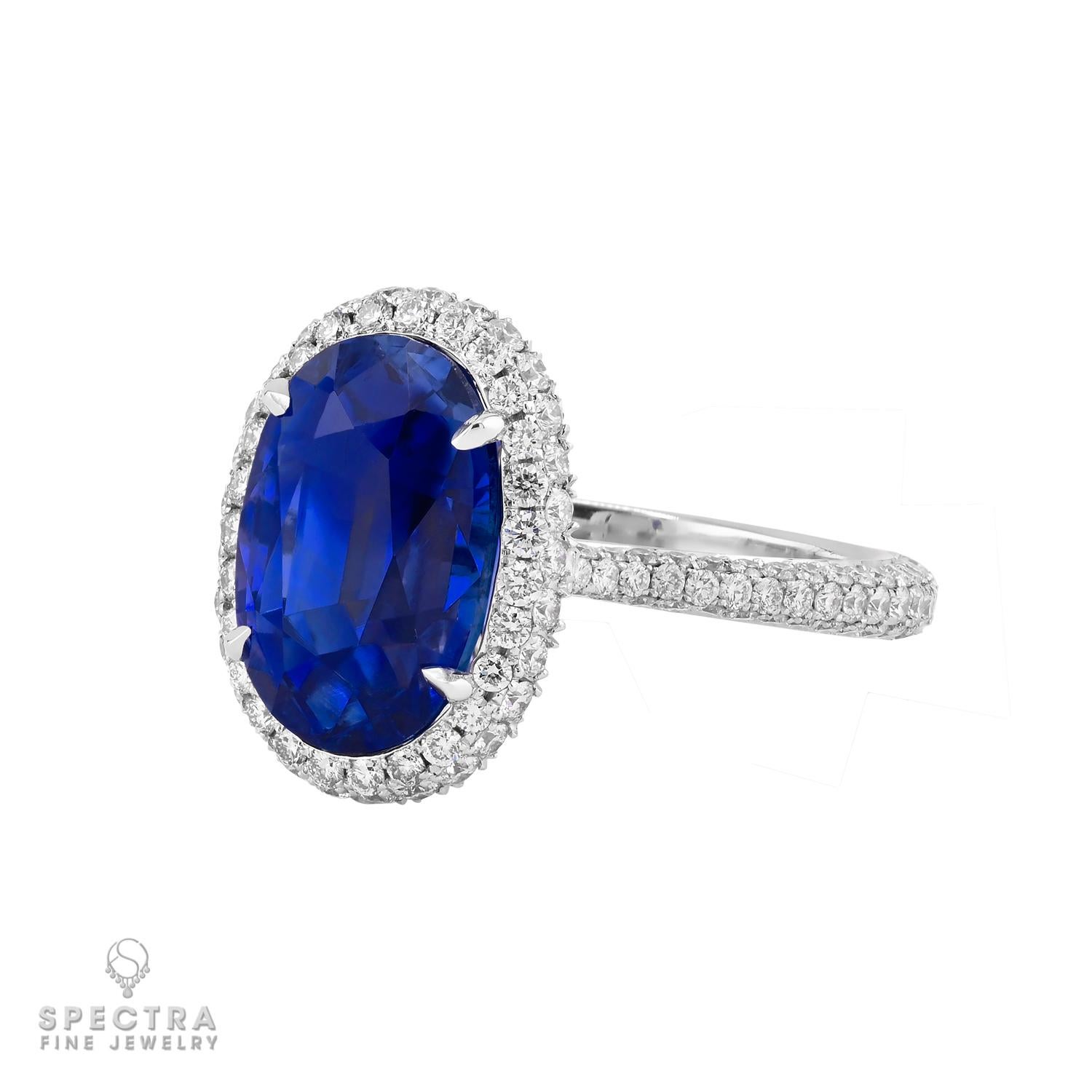 A striking celebration of timeless elegance, this exquisite ring centers a captivating 5.38-carat unheated Ceylon sapphire, prized for its vivid blue hue and natural beauty. Certified by GRS, the oval sapphire radiates a rich glow that is