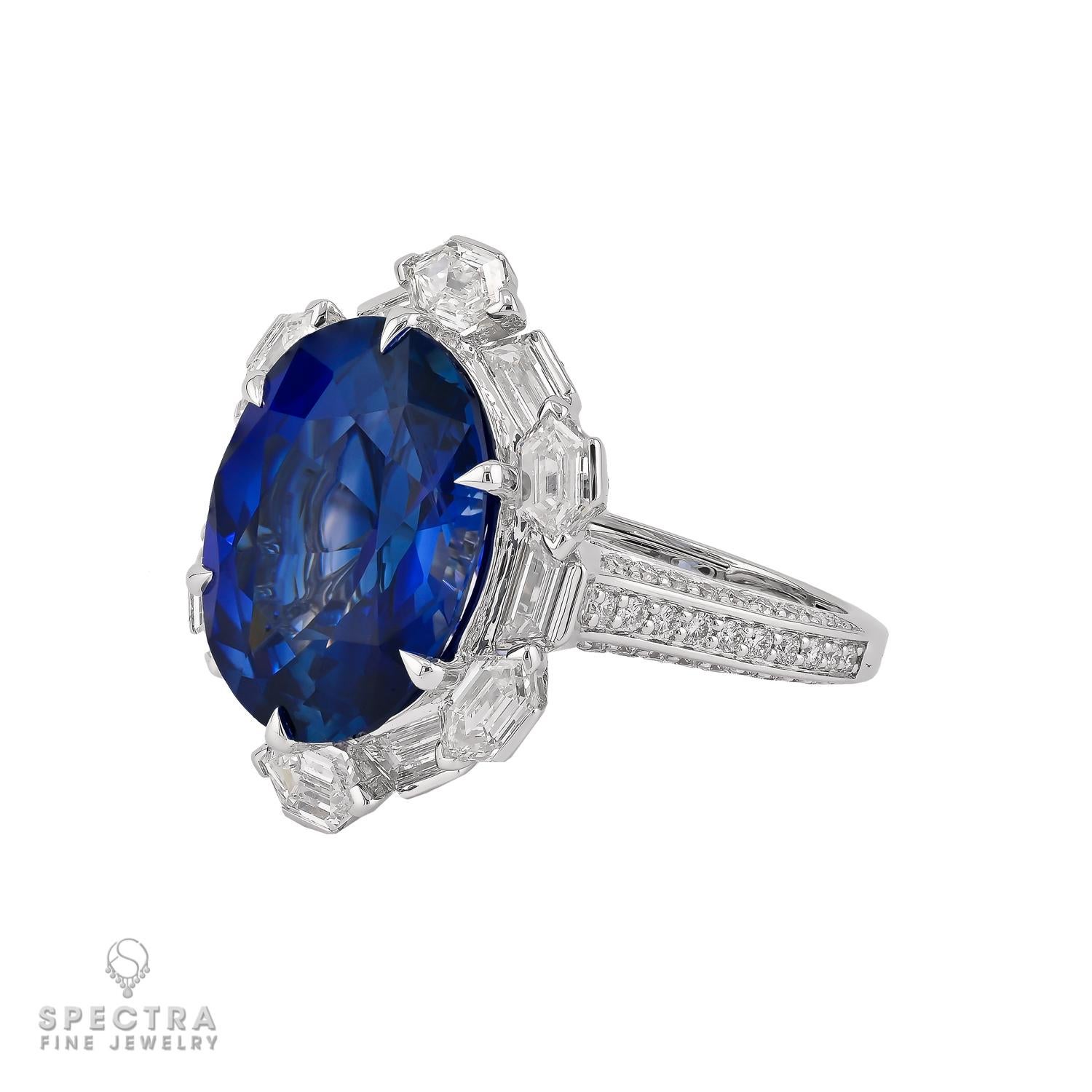 A true showstopper, this stunning ring features a captivating 12.03-carat oval-shaped sapphire from Burma, certified by Gubelin for its natural, unheated beauty. The vibrant blue sapphire is cradled in a sleek 18k white gold setting, weighing 9.52