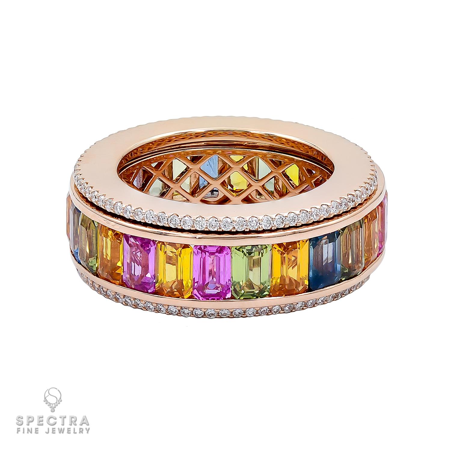 A band ring featuring a spinning center, set with 26 emerald-cut multicolored sapphires weighing a total of 8.79 carats. Smaller model.
21 multi-color sapphires weighing a total of 7.03 carats.
5 pink sapphires weighing a total of 1.76 carats.
The