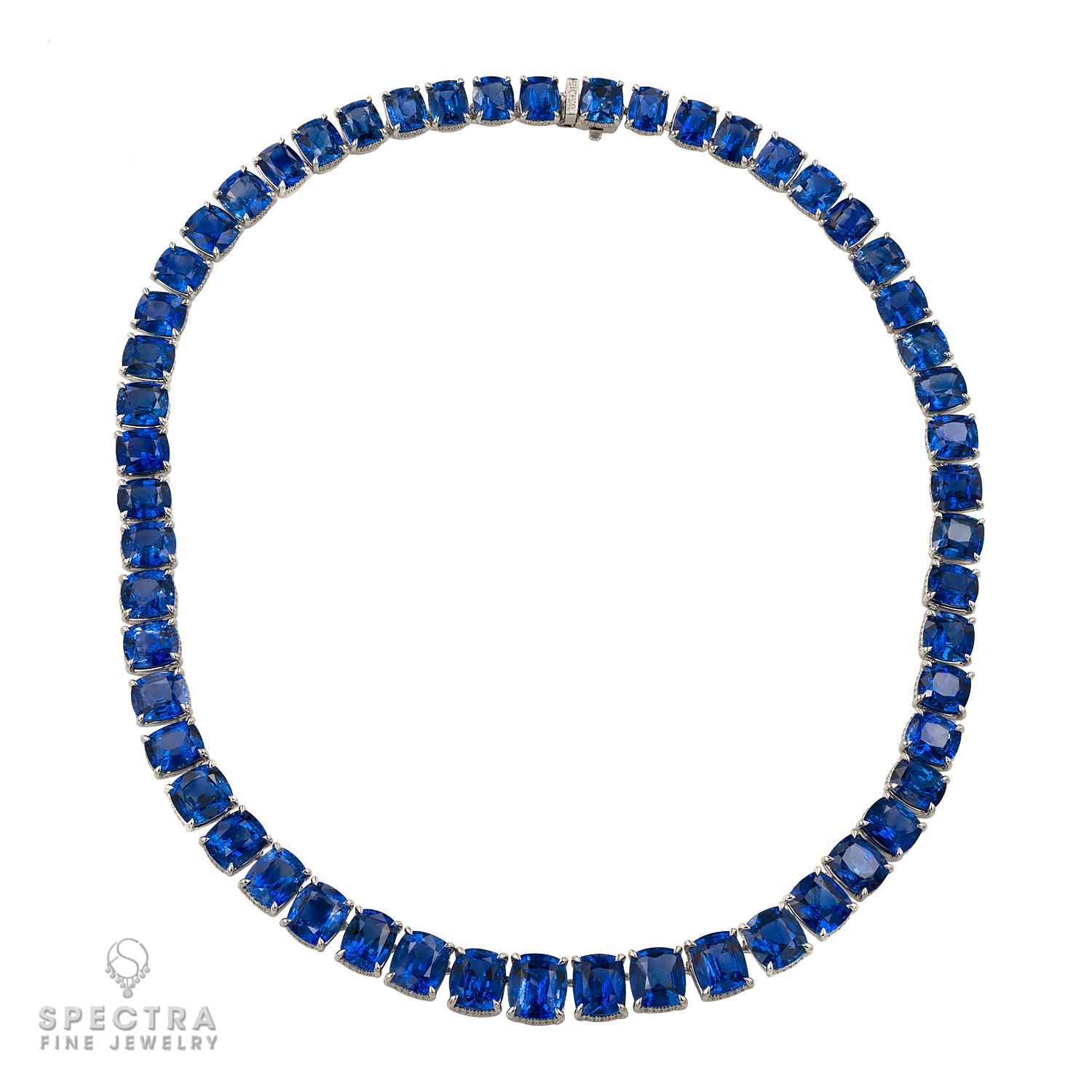 Presenting a sophisticated statement piece: the Ceylon Sapphire Diamond Tennis Necklace crafted from exquisite natural sapphires and diamonds, set in lustrous 18k white gold.
Featuring 58 cushion sapphires totaling an impressive 130.26 carats, each