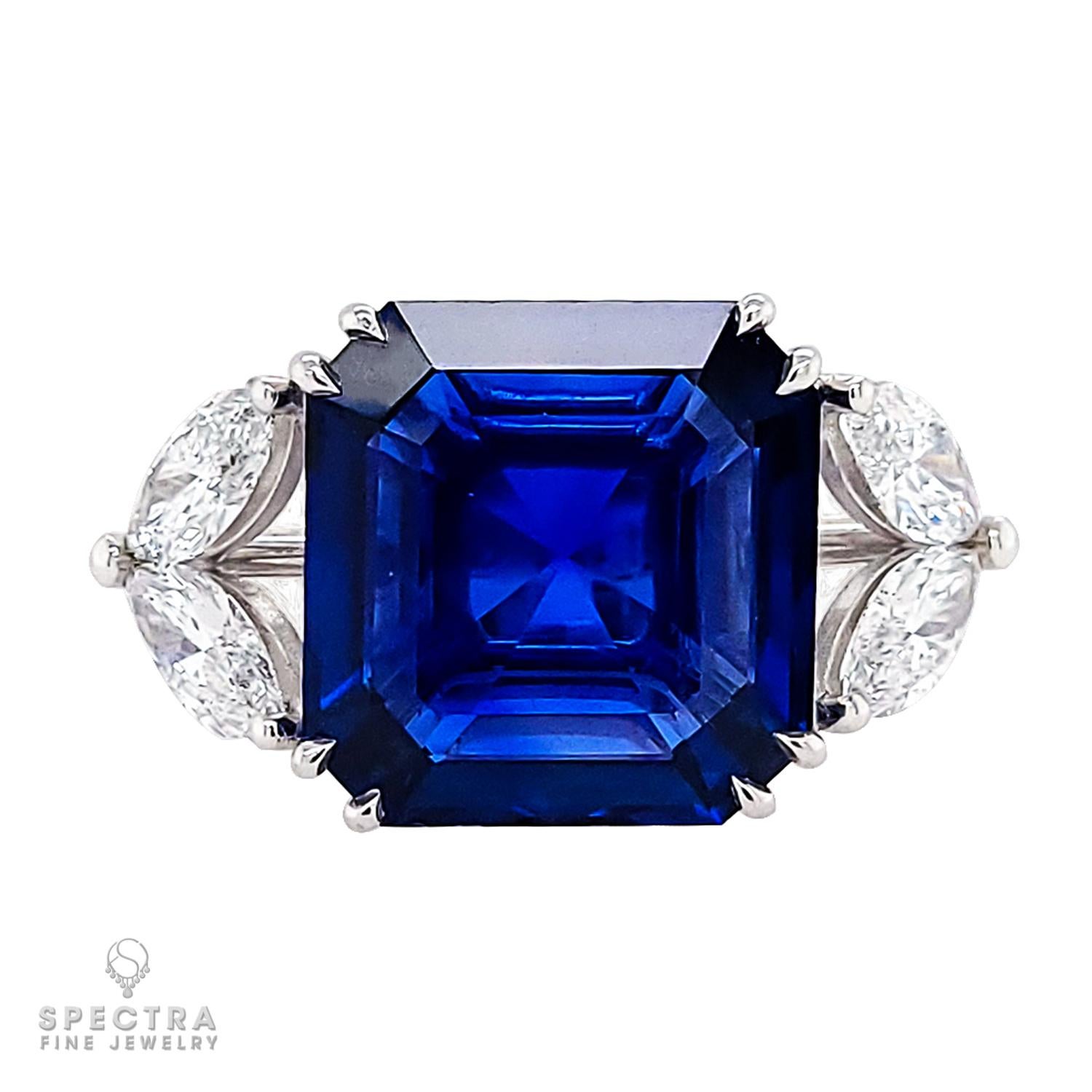 Behold the epitome of elegance and sophistication with this enchanting ring, a masterpiece that seamlessly blends timeless beauty with contemporary allure. Gracing the centerpiece is a mesmerizing 10-carat step-cut sapphire, cradled in a delicate