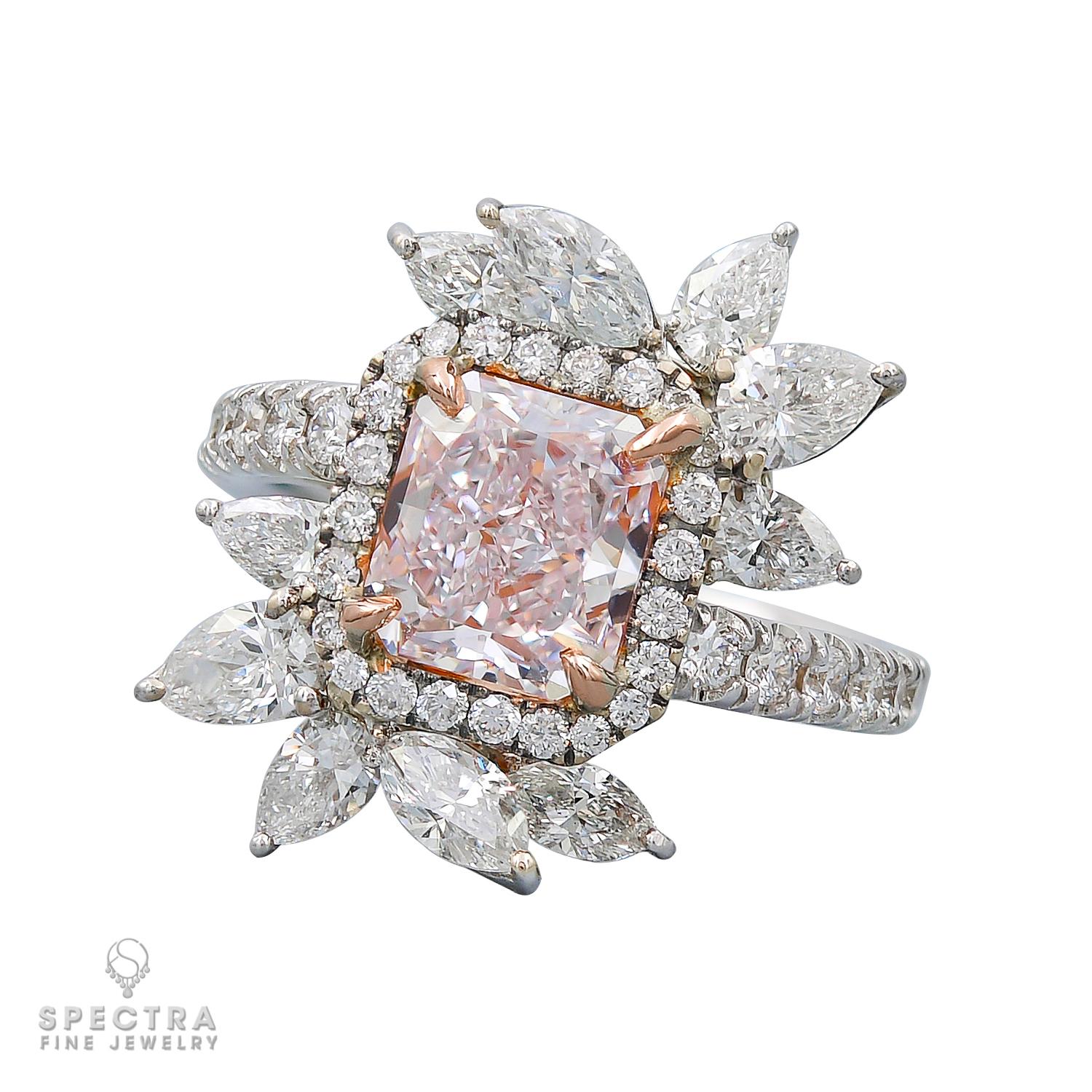 Behold Spectra Fine Jewelry's latest masterpiece, the GIA Certified 2.62 Carat Pink Diamond Cocktail Ring - a mesmerizing symbol of elegance and allure. This exceptional cocktail ring showcases a radiant-cut faint pink diamond at its center,