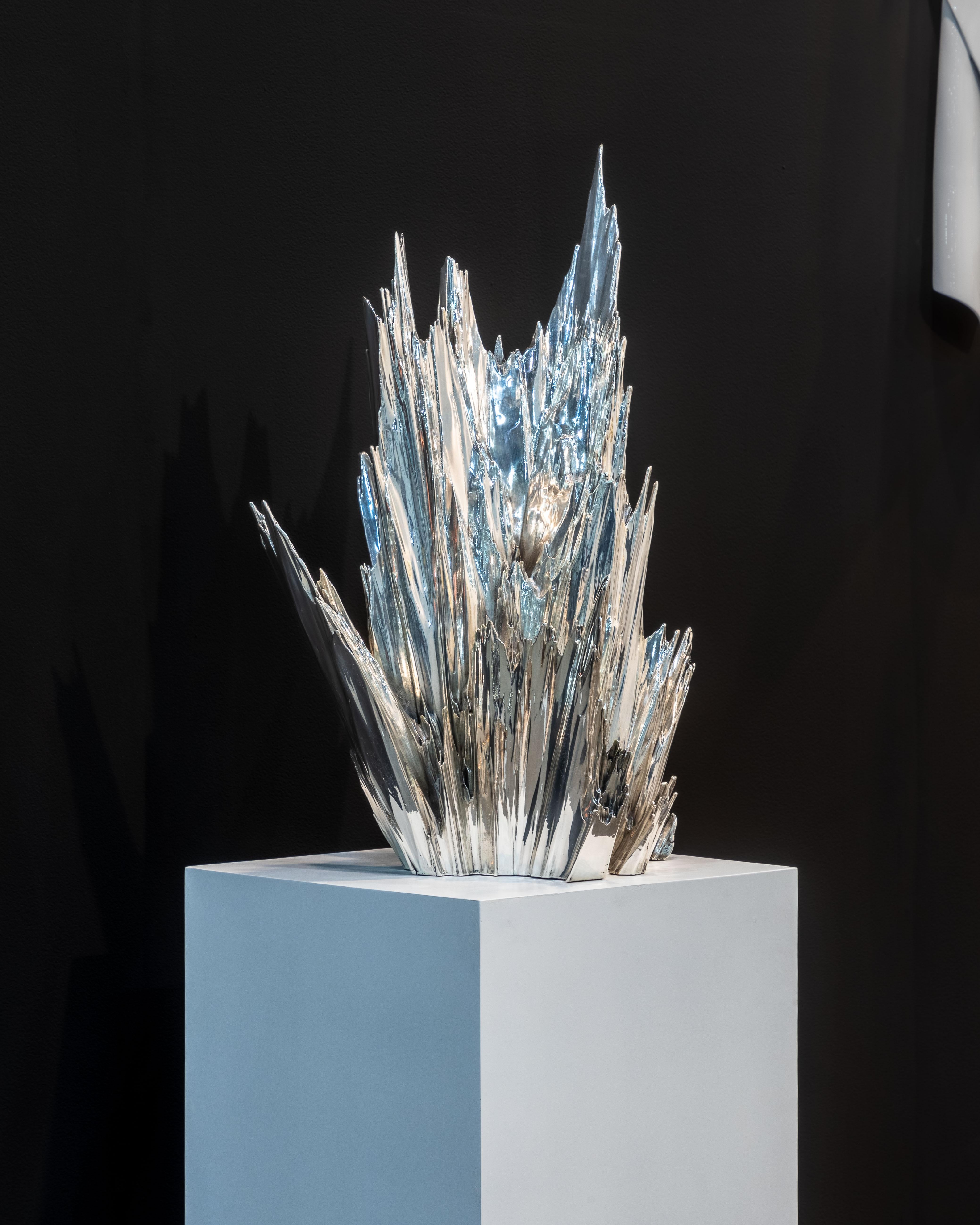 The Rock Sculpture from the Spectra Collection captures the untamed beauty of abstract geological forms. Conceived as if chiseled from the rocks of a surreal landscape, this piece is a celebration of sharp angles and rough textures that challenge