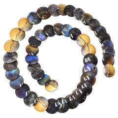 Collana con disco in argento ossidato, spettacrolite e labradorite, Atelier Zobel 2026