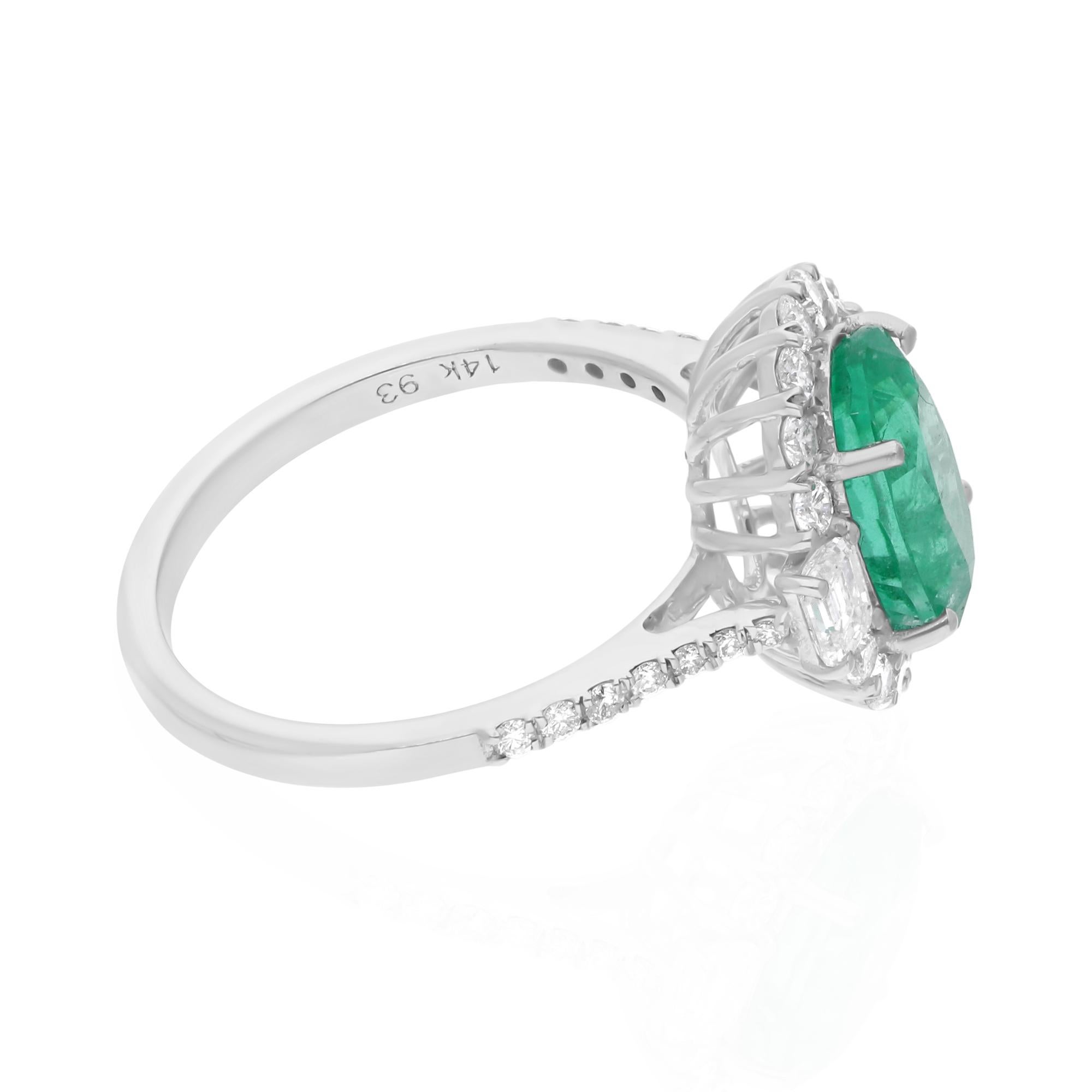 Cast from 14-karat gold, these exquisite ring is handset with 2.59 carats Zambian emerald and 0.61 carats of sparkling diamonds.

The ring is a size 7 US and may be resized to larger or smaller upon request. FOLLOW SPECTRUM JEWELS storefront to view