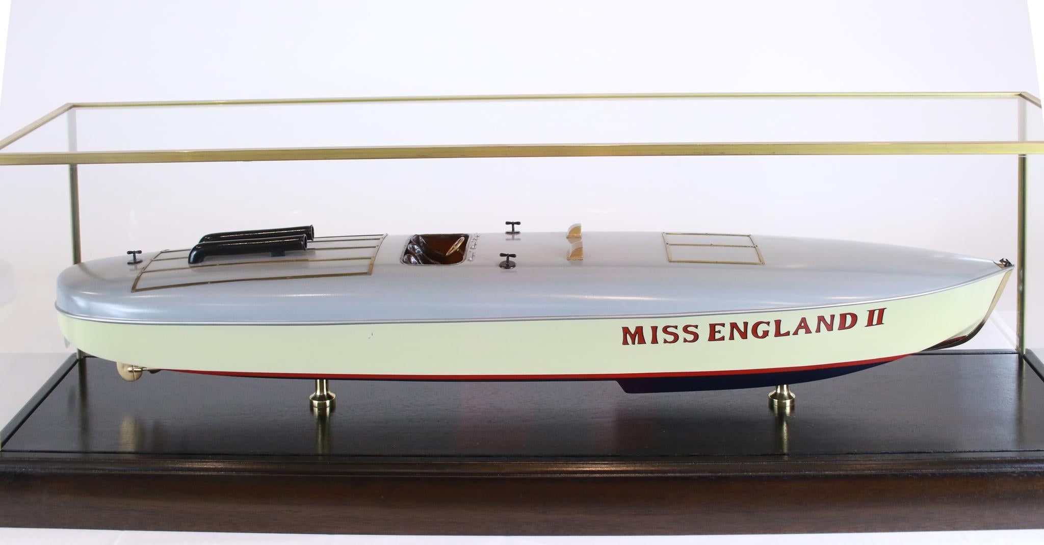 Static model of the early 20th century speedboat Miss England II. Miss England II was a racing monohull hydroplane with twin Rolls-Royce R-type V-12 aero engines specifically designed to contest world water speed records. On June 13, 1930, she broke