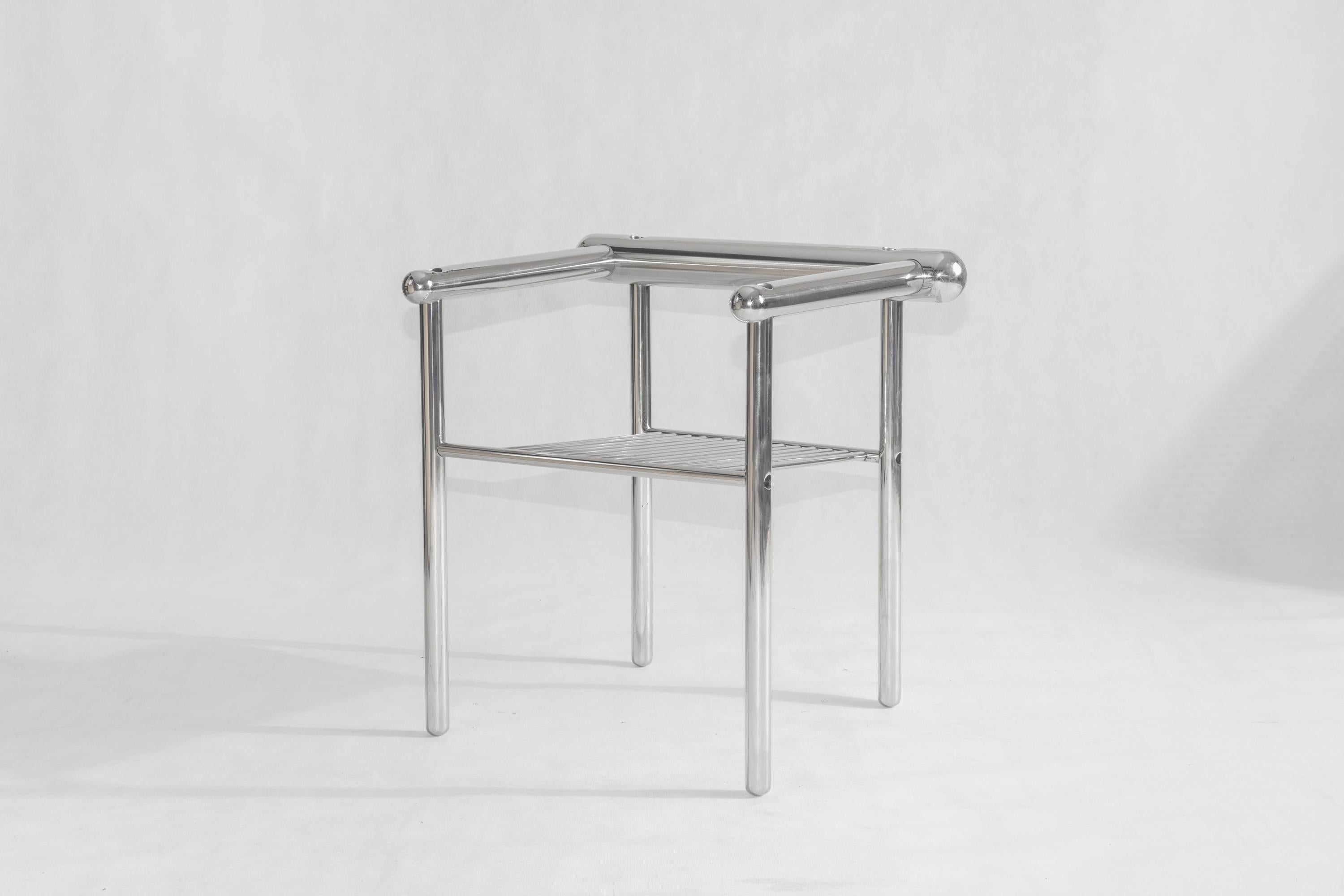 Spektra Chair by  Mati Sipiora
Dimensions: D 54 x W 68 x H 68 cm
Materials: Polished Stainless Steel. 
Finish: Polished stainless steel.
Weight: 10KG (Steel) 9KG (Stainless)
Max Capacity: 120 KG

Spektra is a steel object that functions as an
